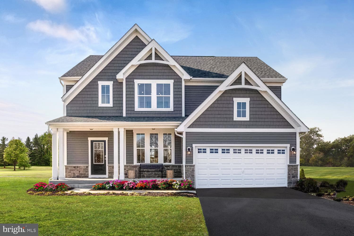 Welcome to the Ashton K at the Reserve at Clearview! As you step through the covered front porch and into this stunning home, you'll be immediately captivated by the spacious 2,945 square-foot floor plan. The open layout is bathed in natural light, streaming through the large windows, creating a bright and welcoming atmosphere throughout.

At the heart of the home is the impressive kitchen, complete with expansive counter space, a large island, plenty of cabinetry, and Whirlpool stainless steel appliances. It flows seamlessly into the adjacent dining area and family room, making it an ideal space for both everyday living and entertaining.

This home features four bedrooms, including a luxurious primary suite with a private sitting area and a spa-inspired en suite bathroom, providing the perfect setting for relaxation. Additional highlights include generously sized secondary bedrooms and a convenient laundry room. The finished lower level offers even more living space, perfect for hosting gatherings or enjoying a quiet retreat.

The Ashton floor plan combines exceptional craftsmanship and thoughtful design, making it the perfect place to call home.

You still have the opportunity to add your personal touch at the design center—select your finishes before the designers do, but act quickly!

Contact us today to schedule a tour and discover all the details this beautiful home has to offer!