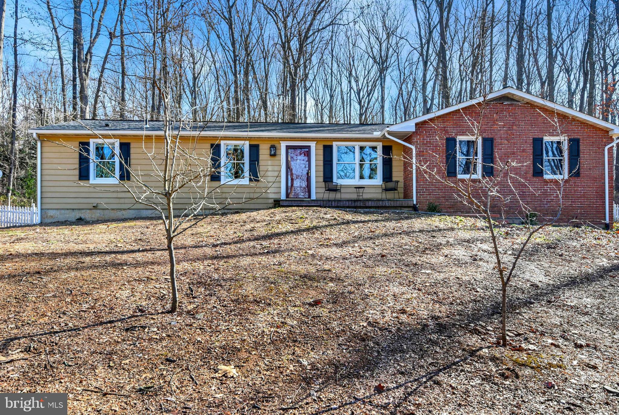 Enjoy a quiet setting nestled in the trees on Leppo Rd. This home features a new roof with new gutters, leafguard and downspouts, new complete central heat and A/C including all new duct work, new appliances, 150" 10 speaker home theater, huge 2 car garage with 14' ceilings and a fresh interior. Large kitchen with plenty of work and storage area. Owner would like to leave furniture, riding mower and lawn equipment.