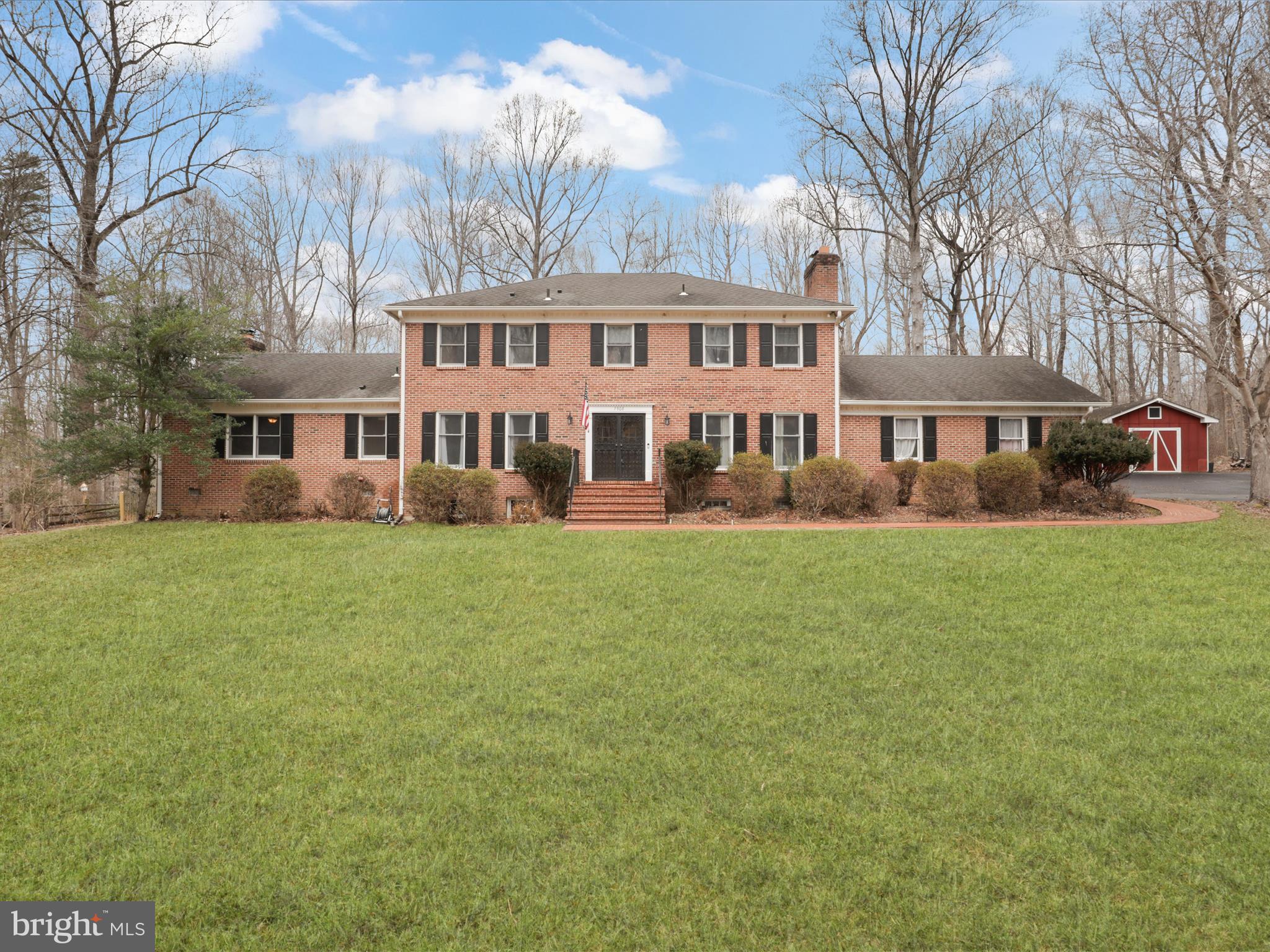 Check out this Gorgeous all Brick Colonial in sought after Turtle Valley Estates located on 5 beautiful acres near Bull Run! You'll love the spacious Chef's Dream Kitchen with island and breakfast area.  The sunny and bright living room and family room both boasts fireplaces.  Plus you get a 'Kachelofen' which is a German Tile Fireplace in the family room that works amazingly to heat the home!!  Hardwood floors in the spacious living and dining rooms. There's a Giant Mud room off the side load 2-car garage 
Plus a main level bedroom or office and full bath, too! The tiled three season room will become the hub of the home!  Upstairs you'll find 4  generously sized bedrooms. Primary Bath features double sinks and two showers, one with a tub.  There's plenty of room for the family to spread out with the lower level recreation room,  additional bedroom, full bath and plenty of storage. You'll love the long driveway leading up to the private entrance of the home and the backyard oasis with gorgeous heated pool and mature landscaping! Don't forget to check out the fire pit.. plus so many beautiful plants and flowers that will soon Spring up throughout the yard. Large Storage shed comes too!
Close to major commuting routes and the best little town around --  Clifton!!! 
Make this happy home YOURS.. today!