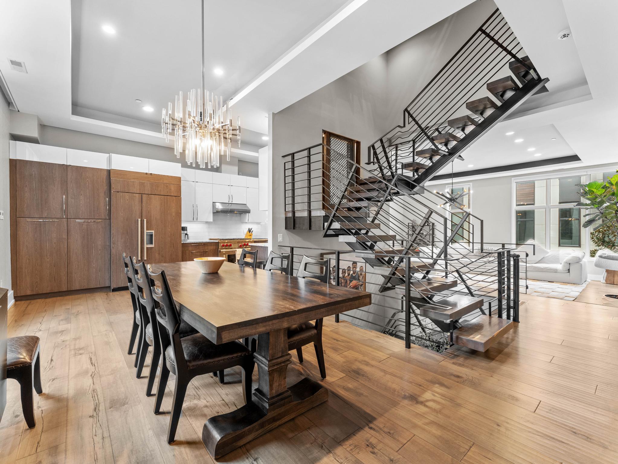 A Rare First Offering. 
A privately curated, custom end-unit masterpiece in one of Philadelphia's most coveted architectural enclaves, freshly refreshed and ready for its next chapter.

Welcome to 822 North American Street, Unit 6. An extraordinary five-story luxury townhome set within an exclusive nine home enclave in the heart of Northern Liberties. Offered for the very first time, this custom end unit residence was conceived with exceptional intention and executed without compromise. Now immaculately refreshed throughout, it presents a rare canvas for the discerning buyer who demands the very best.

Spanning approximately 4,200 square feet across five thoughtfully designed levels, the home commands six bedrooms, five full bathrooms, and one half bathroom. A private elevator services every level, and a dramatic two tier staircase connects each floor with architectural intention, creating a sense of arrival at every level.

The floor plan is a masterclass in flow and scale. The entry level welcomes you with a generous living area, a ground floor bedroom with private ensuite bath, and direct access to a private patio. One floor up, the second level opens into the heart of the home: a chef's kitchen, open dining and living space, a half bath, and a private balcony. The third level is devoted to the primary suite with a spa inspired bathroom, alongside a second bedroom with its own private bath, a balcony, and dedicated laundry. The fourth level delivers an expansive upper living space and three additional bedrooms, one ensuite, two sharing a hall bathroom. And crowning it all a sweeping rooftop deck with commanding Philadelphia skyline views.

A secured two-car garage, private elevator, keyless entry, intercom and security systems, and premium finishes throughout complete a home that has anticipated every need before you knew to ask.

As the end unit within this exclusive enclave, Unit 6 offers the privacy and architectural presence befitting a residence of this caliber  In the heart of Northern Liberties' celebrated dining, boutique retail, parks, and transit, and just minutes from Center City.

Freshly painted and refreshed throughout. Offered for the very first time. An opportunity that will not come again.