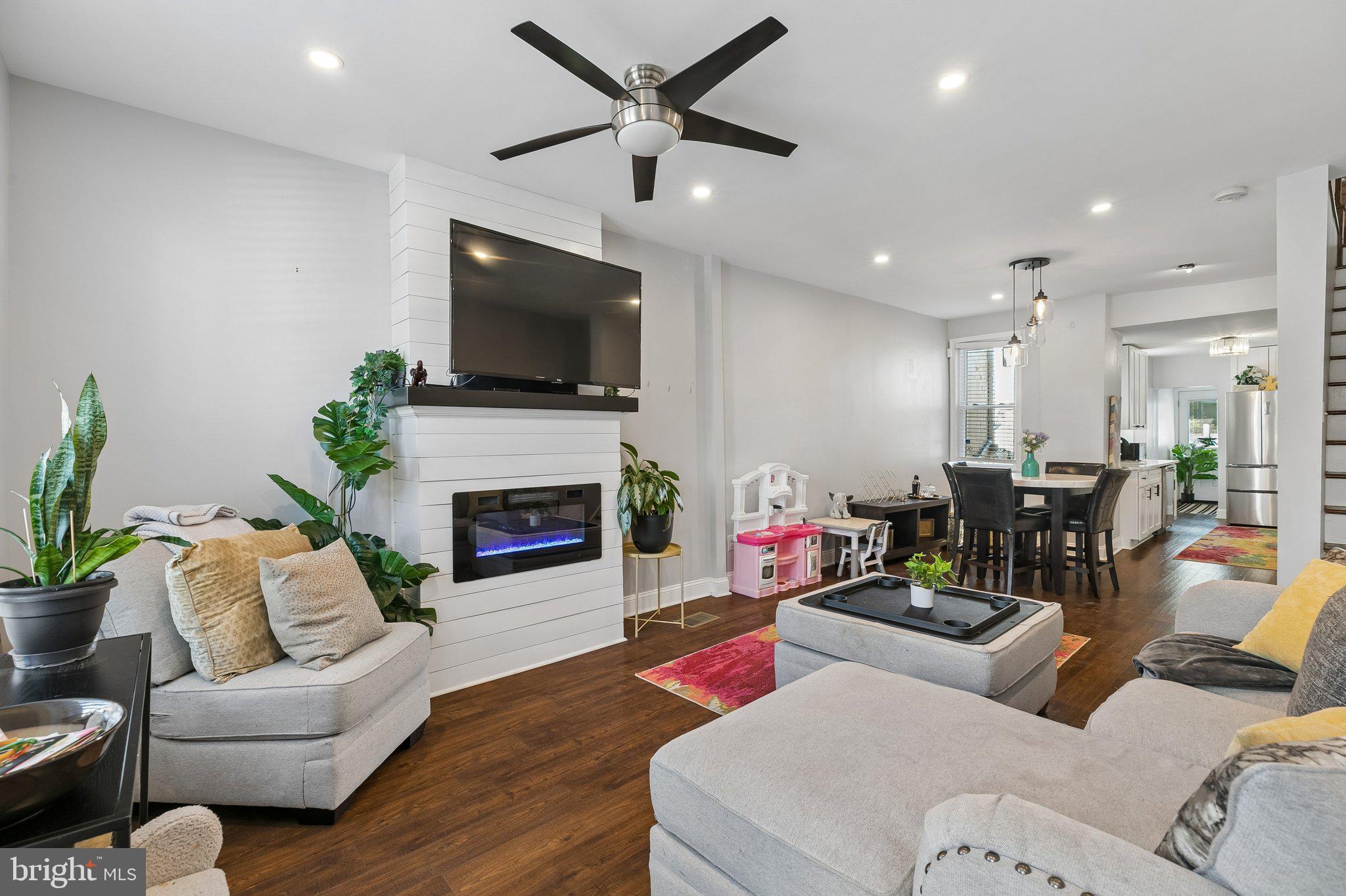 This Germantown charmer is the perfect place to begin your homeownership journey! Thoughtfully updated in 2021, this home combines modern style with cozy comfort. Picture yourself unwinding in the sun-filled family room, complete with an electric fireplace for those chilly evenings this fall cheering on "Da Birds" with friends! The kitchen is sleek and functional, featuring stainless steel appliances, clean modern lines, and easy access to the backyard—ideal for summer BBQs or letting the pup out for a potty break being fully fenced in!

Upstairs, you'll find light-filled, inviting bedrooms, designed to feel like your personal retreat. With a beautifully updated bathroom on each level, you’ll love the blend of practicality and style.

But it’s not just about the house—it’s the lifestyle! Located across the street from the Boys and Girls Club, and just steps from Weavers Co-op, a daycare, a playground, and an elementary school only two blocks away, this neighborhood is all about convenience and community.

Don’t miss your chance to see this home and start building your story here.