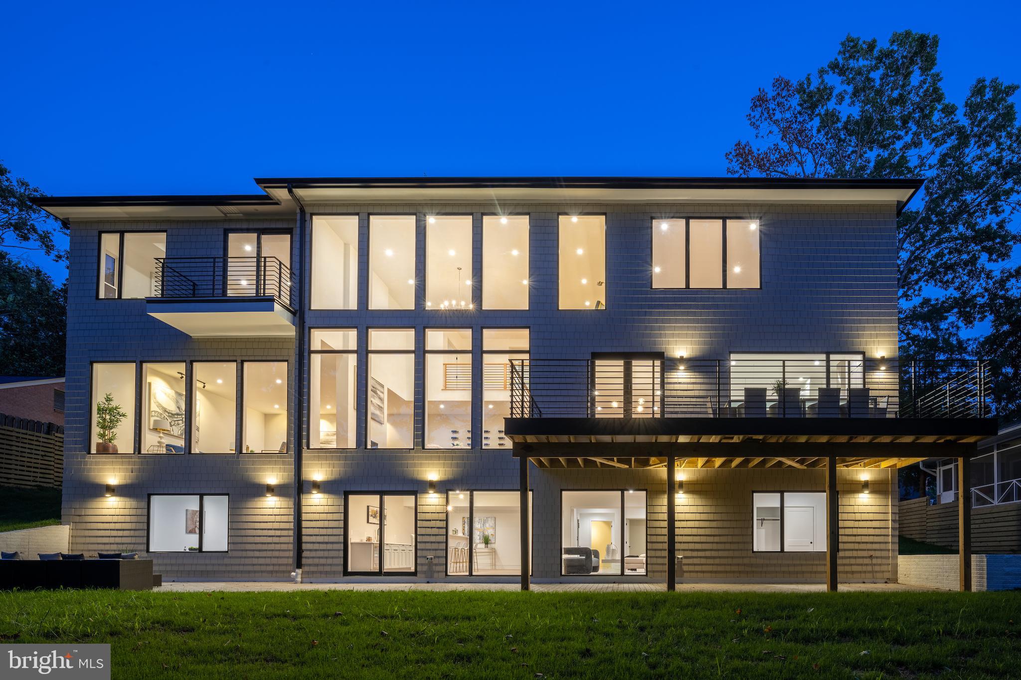 Designed by GOLD MEDAL WINNER OF THE 2022 GLOBAL FUTURE DESIGN AWARDS.  This breathtaking modern masterpiece has been thoughfully designed to enhance the natural beauty of its 15,007 sq. ft. property in sought-after Chesterbrook Woods. This ONE-OF-A-KIND TRANSITIONAL/CONTEMPORARY home masterfully eliminates visual barriers between indoors and outdoors. Featuring 6 bedrooms and 6 bathrooms, this home offers everything you’ve been looking for and more. Unique, eye-catching features will grab your attention from the moment you enter the grand story foyer and around every corner of this grand 7,800+ sq.ft. showpiece . The designer gourmet kitchen includes quartz countertops and an expansive waterfall-style island with seating, high-end stainless-steel appliances, and custom cabinetry. The stunning two-story Great Room features a dramatic 20 ft ceiling with exposed upper level library and floor-to-ceiling windows, providing extraordinary natural lighting and an impressive view of the backyard and expansive paver patio. A stylish double-sided gas fireplace separates the luxurious Great Room from the formal Dining Room. An office space/bedroom with a full bath completes the spacious main level. The spa-like primary retreat encapsulates luxury with its modern finishes, “his” and “her” walk-in closets, elegant bathroom, private balcony, and fireplace. Three generous secondary bedrooms with en-suite bathrooms, walk-in closets, and modern highlights, including oversized windows overlooking the green roof garden. The thoughtfully designed basement includes a guest bedroom with full bath, recreation room, fitness room, theatre room, and wet bar with access to the expansive paver patio (with gas line for a grill and space for a future outdoor kitchen) and fully fenced backyard. Hardwood flooring, high ceilings, custom modern lighting and finishes, and professional landscaping. 3 CAR GARAGE, ELEVATOR, MULTIPLE SPECTACULAR INDOOR AND OUTDOOR ENTERTAINING SPACES, FLOOR TO CEILING WINDOWS, AND ROOM FOR AN OUTDOOR POOL!  
Conveniently located near McLean parks, shops and restaurants. Just 2 stoplights to Washington D.C. via the Chain Bridge. Highly sought-after CHESTERBROOK ES, LONGFELLOW MS, MCLEAN HS