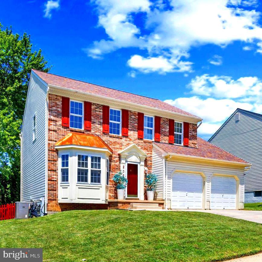 Welcome home! This fabulous brick-front colonial features an ideal layout, a freshly painted interior, and a standout lot. The fully renovated eat-in kitchen boasts quartz countertops, brand-new stainless steel appliances (including a gas range), and all-new cabinetry. It opens seamlessly to the cozy family room with a wood-burning fireplace, ceiling fan, and sliding glass doors to the deck overlooking the fully fenced rear yard. A light-filled living room with a charming bay window and a formal dining room accented by crown molding and chair railing create inviting spaces for everyday living and entertaining. Brand-new wide-plank flooring, a convenient powder room, and a spacious 2-car garage complete the main level.
Meticulous maintenance and upgrades shine throughout, including a brand-new washer and dryer, new interior doors, updated bathroom vanities, and new toilets. For added peace of mind, the chimney has been inspected and the furnace freshly serviced. Upstairs offers three generously sized bedrooms, a full hall bath with updated tile flooring and a primary suite featuring vaulted ceilings and a private en-suite bath. The lower level provides fantastic expansion potential—already plumbed for a half bath, pre-wired for easy finishing, and equipped with 220V power (also available in the garage).

Additional Highlights:

Architectural shingle roof (2026)
High-efficiency gas HVAC 
Water heater (2026)
Double-hung windows & motorized blinds
Prime location close to daily conveniences and commuter routes
Turnkey and ready for its new owners—just bring your furniture!