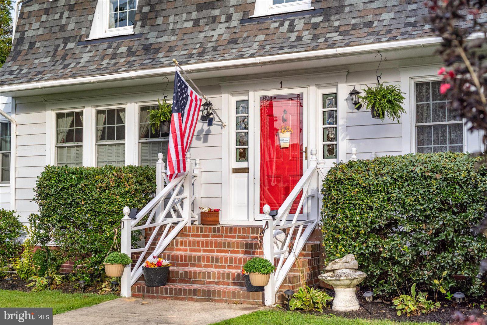 Beautifully maintained, move-in ready, and turnkey, this Dutch Colonial historic home on the National Register of Historic Places combines timeless character with the freedom to personalize without local historic district restrictions and with no HOA. Extensive upgrades provide peace of mind, including a NEW 2023 roof with 47-year warranty, dual high-efficiency heat pumps under warranty, updated plumbing and electrical, 39 replacement double-hung windows, oil boiler backup, and a full dry basement.

The grand center hall foyer showcases original hardwood floors, a staircase, Craftsman trim, French doors, glass doorknobs, crown molding, and cast-iron radiators. Three sets of French doors create seamless flow throughout the main level. Gather in the living room around the wood-burning fireplace, relax on the window seat, or use the sunroom as a home office, remote-work space, flex room, or additional living area. The formal dining room offers Craftsman corner cabinetry and an elegant chandelier. The updated chef's kitchen features custom cabinetry, breakfast bar, and breakfast nook.

This home offers 3 bedrooms, 2.5 baths, including a convenient main-level powder room, and second-floor laundry. The primary suite features a private bath with jetted soaking tub and separate shower. A partially finished walk-up attic offers bonus space and storage. With major infrastructure improvements already completed, this home is ready for you to enjoy.

Designed for outdoor living and outdoor entertaining, the screened porch overlooks the fenced backyard. Mature landscaping, a storage shed, and an Amish-built garage with remote opener add convenience.

Walk one block to downtown restaurants, shops, festivals, farmers markets, and community events. The Pocomoke River, public docks, boat slips, Cypress Park, scenic riverfront walking trail, pickleball courts, tennis courts, concerts, and outdoor recreation are moments away. Minutes to Ocean City, Chincoteague Island, Assateague National Seashore, Berlin, and the Atlantic Coast. Convenient to Washington DC, Baltimore, Philadelphia, New Jersey, and New York, offering historic charm, coastal recreation, walkability, and outstanding value compared to many higher-priced coastal and metropolitan markets. Simply move in, unpack, and breathe. Private in-person and virtual tours available.