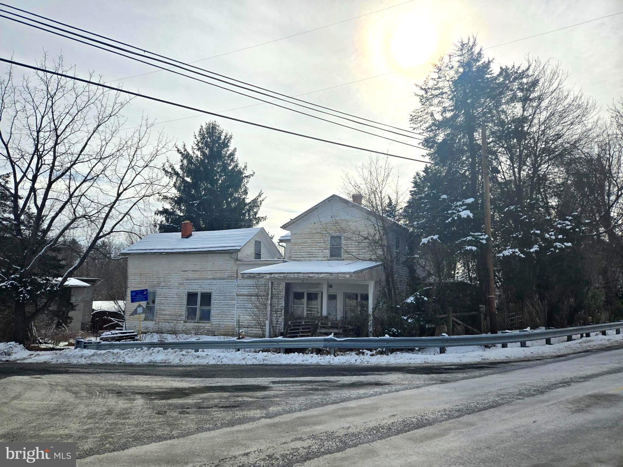 Welcome to the quaint village of Conicville and one of the mainstay homes from yesteryear. This 1871 home with 5 bedrooms and 1 bathroom sits on a generous 1.42 acres parcel at the intersection of Conicville Road and Route 42.  What once served as the Conicville Post Office and a general store, you can also step back in time to the side of the family home that is more traditional with hard wood floors and craftsman woodwork. The property is currently zoned business. Entertain “out of the box “opportunities and breathe new life into this property. Turning the landmark back into a home and business would take some hard work due to current conditions, however investors won’t want to miss out on this unique property.  The water source for the home is a cistern and there is a septic system in place. Conveniently located just 12 miles from Woodstock and 8 miles from Bryce Resort. This property is being sold “as is/where is”. The owners will not be responsible for the final clear out any remaining personal property.  Please review all DEQ documents as it relates to the history of this property. A signed/completed Hold Harmless document must be returned to the list agent/broker prior to showing the property.