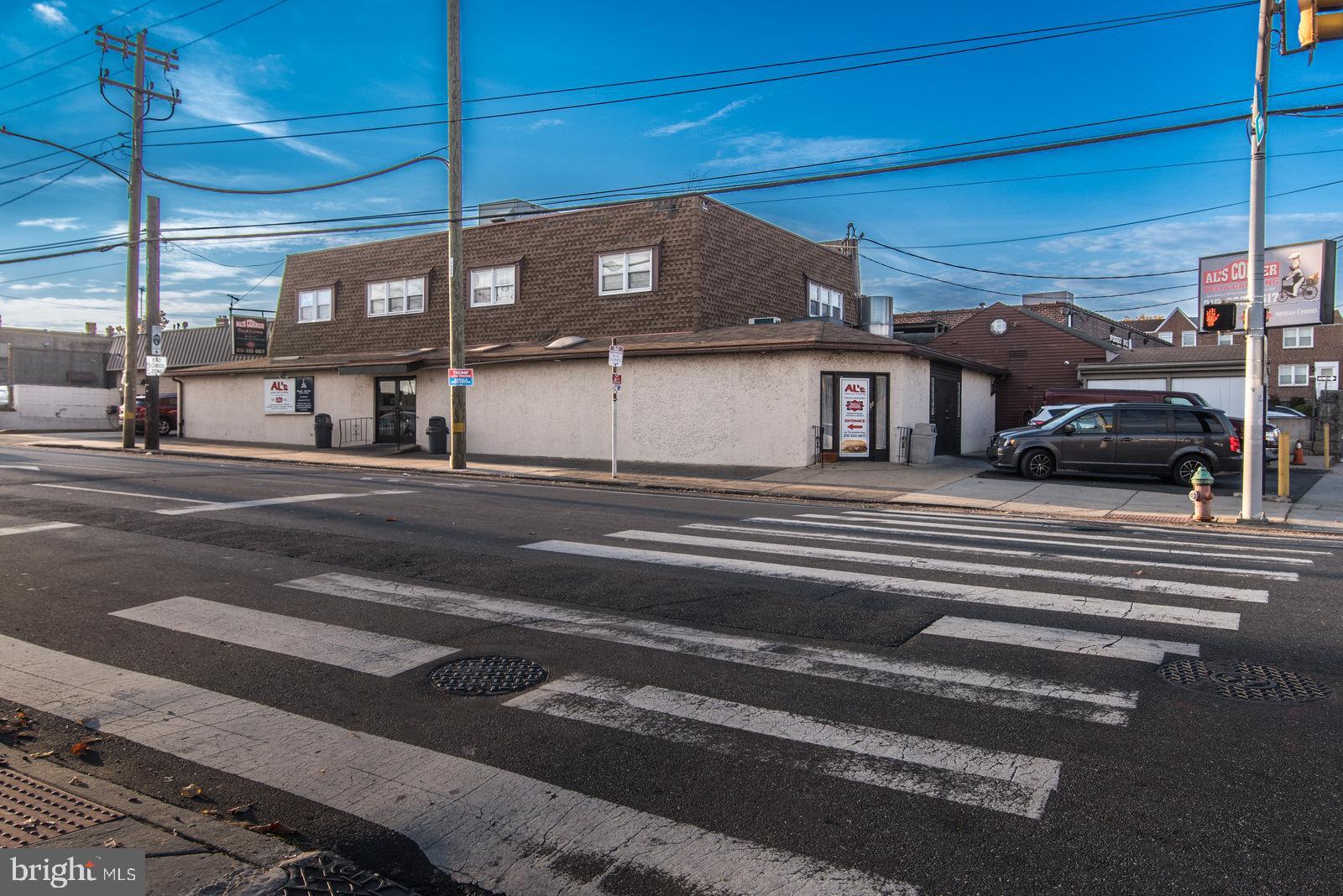 Seize this incredible opportunity to purchase this huge, highly visible, corner,  commercial mixed use property.  The 8,412 sqft property features CMX1 zoning with 6132 sqft of 1st floor commercial/retail space and 2280 sqft of 2nd floor apartment space.  There are currently (2) huge two bedroom apartments with all separate utilities and central air throughout the entire building.  There are  7 off street parking spots. and lots of street parking. The commercial space has been occupied by a family owned Deli that has operated for the last 48 years from this location.  The property is located at the busy corner of Rhawn and Torresdale in the densely populated Mayfair area. This is a great investment opportunity for an investor but more important is the rarely offered opportunity to grow your business in a prime spot that people have been coming to for 48 years.  Serious inquiries please contact the Listing Agent for more detailed information and to schedule a showing.