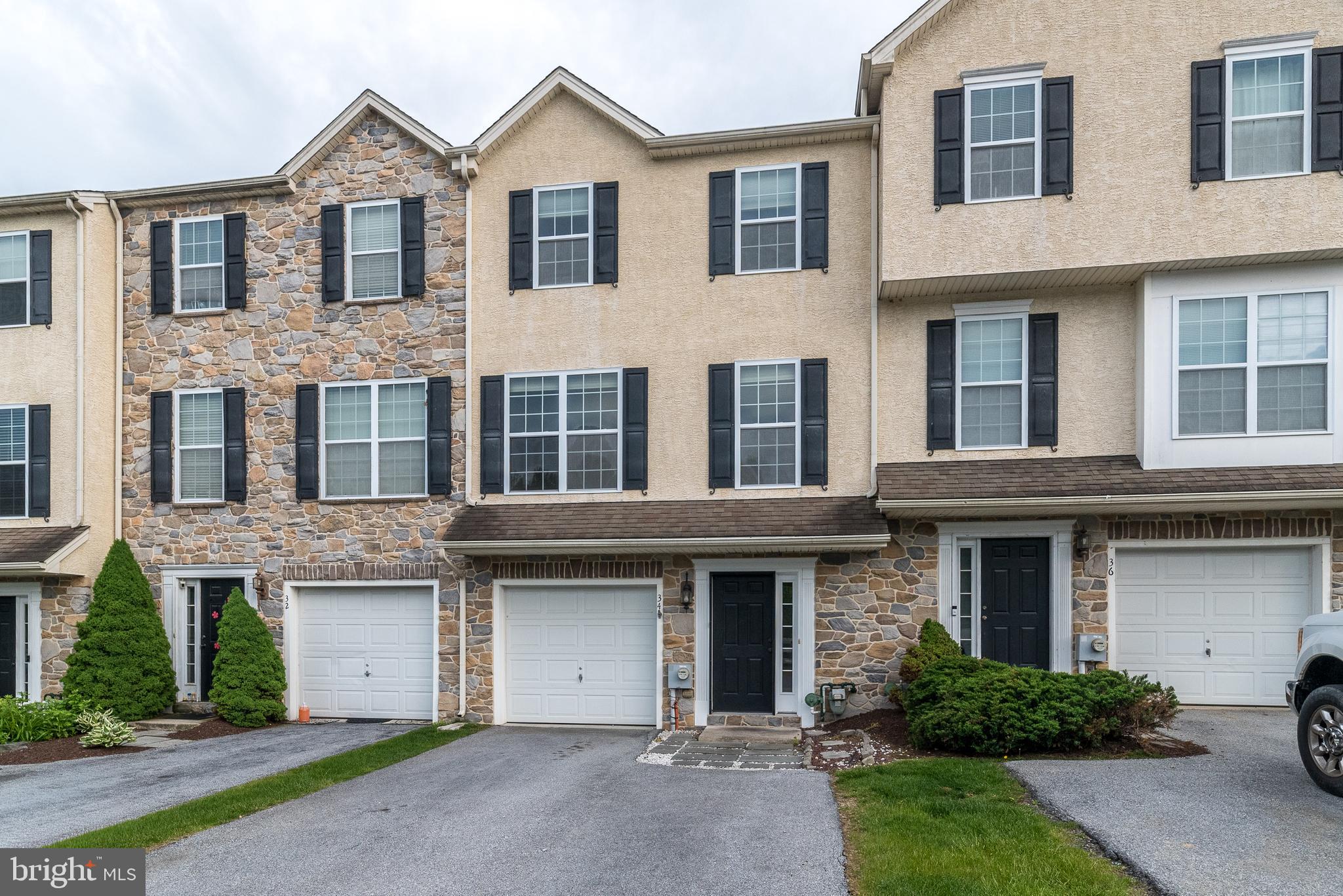 Welcome to 34 Lukens Mill Drive — where style, space, and convenience come together in one of Coatesville’s most desirable communities!

This beautifully maintained 3-bedroom, 2.5-bath home offers the perfect blend of comfort and functionality with an open-concept layout designed for modern living. From the moment you walk in, you’ll love the bright and inviting feel, spacious living areas, and seamless flow that makes both everyday life and entertaining easy.

The kitchen serves as the heart of the home with abundant cabinetry, generous counter space, and room to gather with family and friends. The adjoining dining and living spaces create an ideal setup for hosting holidays, movie nights, or relaxing evenings at home.

Upstairs, the spacious primary suite offers a private retreat complete with an en-suite bath and ample closet space. Two additional bedrooms provide flexibility for guests, family, a home office, or workout space.

The finished lower level adds even more room to spread out — perfect for a second family room, game room, media space, or play area. Step outside and enjoy outdoor living from the rear deck, ideal for morning coffee or summer evenings.

With central air, garage parking, stylish finishes, and low-maintenance living, this home checks all the boxes. Conveniently located near shopping, dining, parks, and major commuter routes, you’ll enjoy easy access to everything while still feeling tucked into a welcoming neighborhood setting.

Homes with this much space and value don’t come along often — schedule your private showing today before this opportunity is gone!
