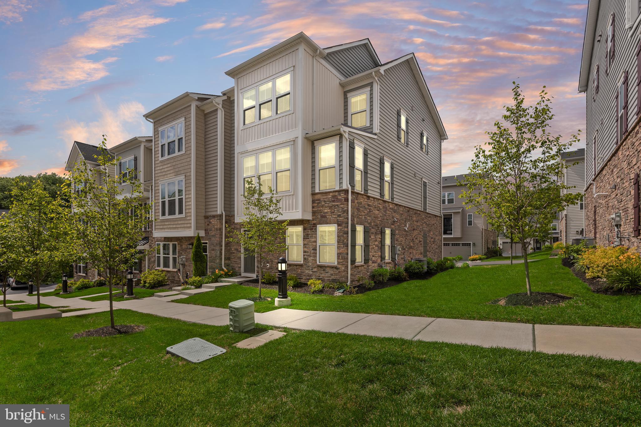 Welcome to 223 Grant Xing in the highly desirable Ponds Edge community of Media! This stunning NVHomes Serenade model offers over 2,100 sqft of thoughtfully designed living space featuring 3 bedrooms, 2.5 baths, and a rear entry garage. The stylish living space includes a finished lower level, open concept main level, gourmet kitchen with an oversized island, covered deck, and a luxurious owners suite with walk in closet. Built in 2022 this nearly new home combines modern finishes, low maintenance living, and an unbeatable location within the award winning Rose Tree Media school district, just minutes from downtown Media, dining, and parks. Move right in and enjoy the best Delco has to offer!