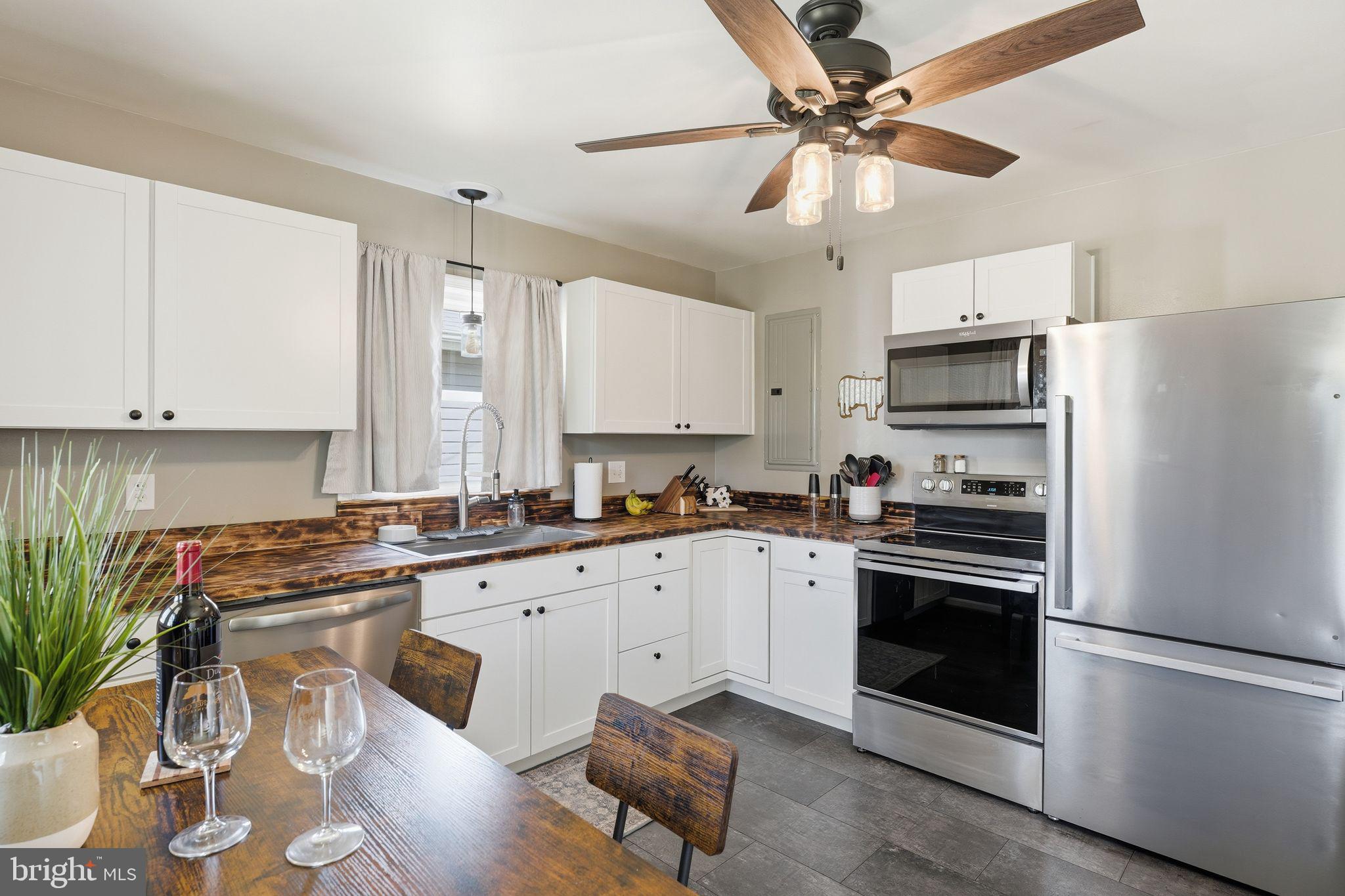 ✨ An incredible opportunity to own your first home and start building real equity! ✨ This charming 2-bedroom, 1-bath single-family home offers the perfect alternative to renting—giving you the freedom of homeownership with no HOA and a manageable yard ideal for gardening 🌿, entertaining 🍷, or relaxing by a cozy fire pit 🔥.

📍 Location, location! Enjoy the convenience of being within walking distance to local shops, restaurants, and schools, making everyday living easy and accessible.

Step inside to find beautiful hardwood flooring throughout the main living areas, paired with a thoughtfully updated kitchen featuring LVP flooring, butcher block countertops, updated cabinetry, and newer appliances—all completed within the last two years. Major updates provide peace of mind, including a roof just 2 years young 🏡 and windows replaced approximately 3 years ago.

Whether you're just starting out, downsizing, or looking for a smart investment 💰, this home delivers comfort, updates, and long-term value in one inviting package.

🛠️ Seller is offering a one-year home warranty for added confidence.
🚪 Don’t miss your chance to stop renting and start building your future—this is the one!
