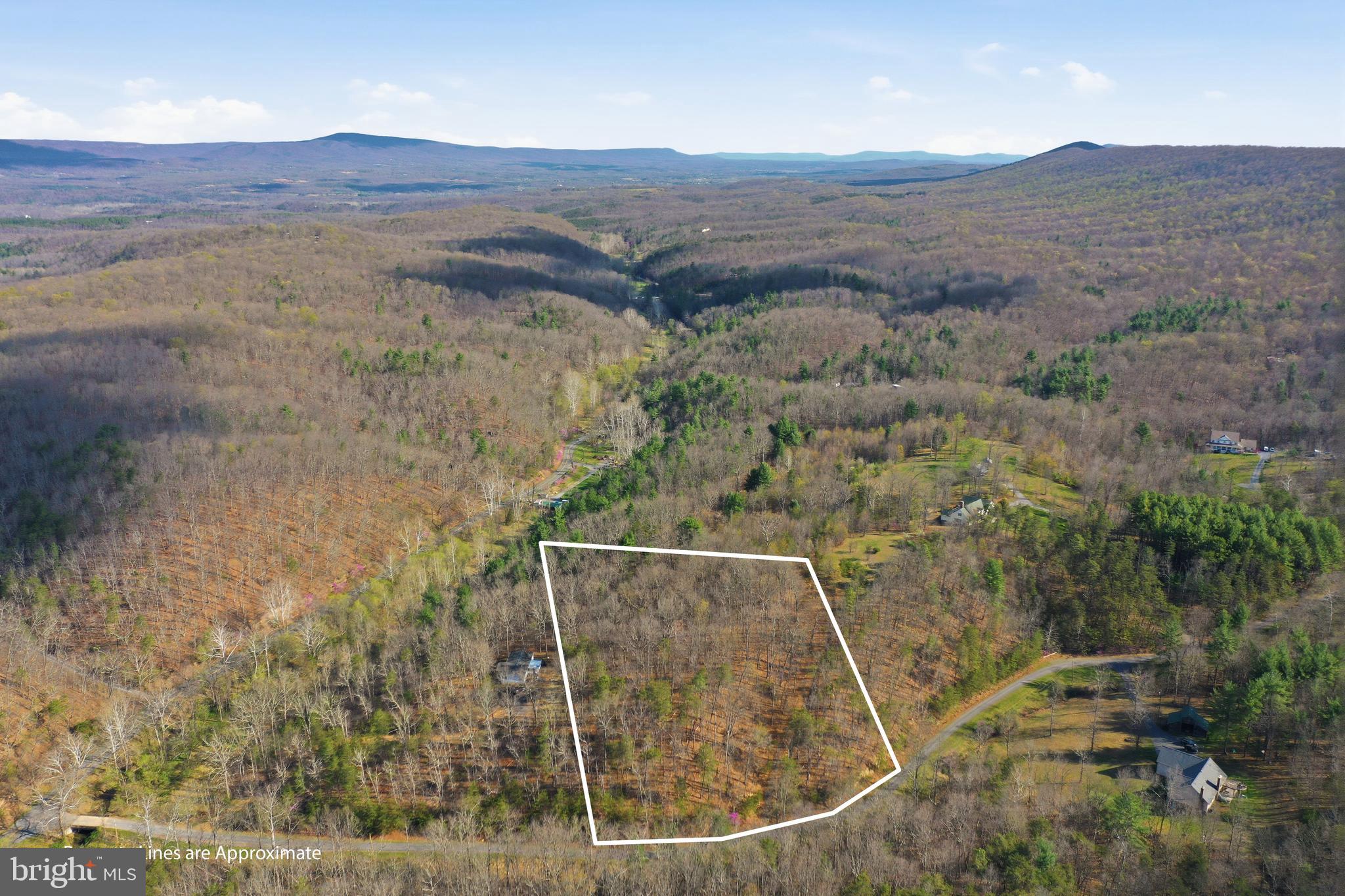 *Price Improvement* Discover the perfect blend of privacy and natural beauty with this 5.49-acre parcel on Whispering Knolls Dr in Winchester, VA. Nestled among scenic country roads, this property offers a peaceful setting to build your dream home. Located approximately 6 miles from I-81, it provides a manageable commute while still offering the charm of rural living. Winchester Medical Center is less than 10 miles away, with farmers markets, dining, and shopping also within easy reach. Situated off a paved road, the property features an established driveway (in need of improvement), along with a completed survey and soil study for a 4 bedroom perc—saving you time as you plan your build. Whether you're ready to build now or simply looking for a serene piece of land to call your own, this property captures the beauty and simplicity of country living.