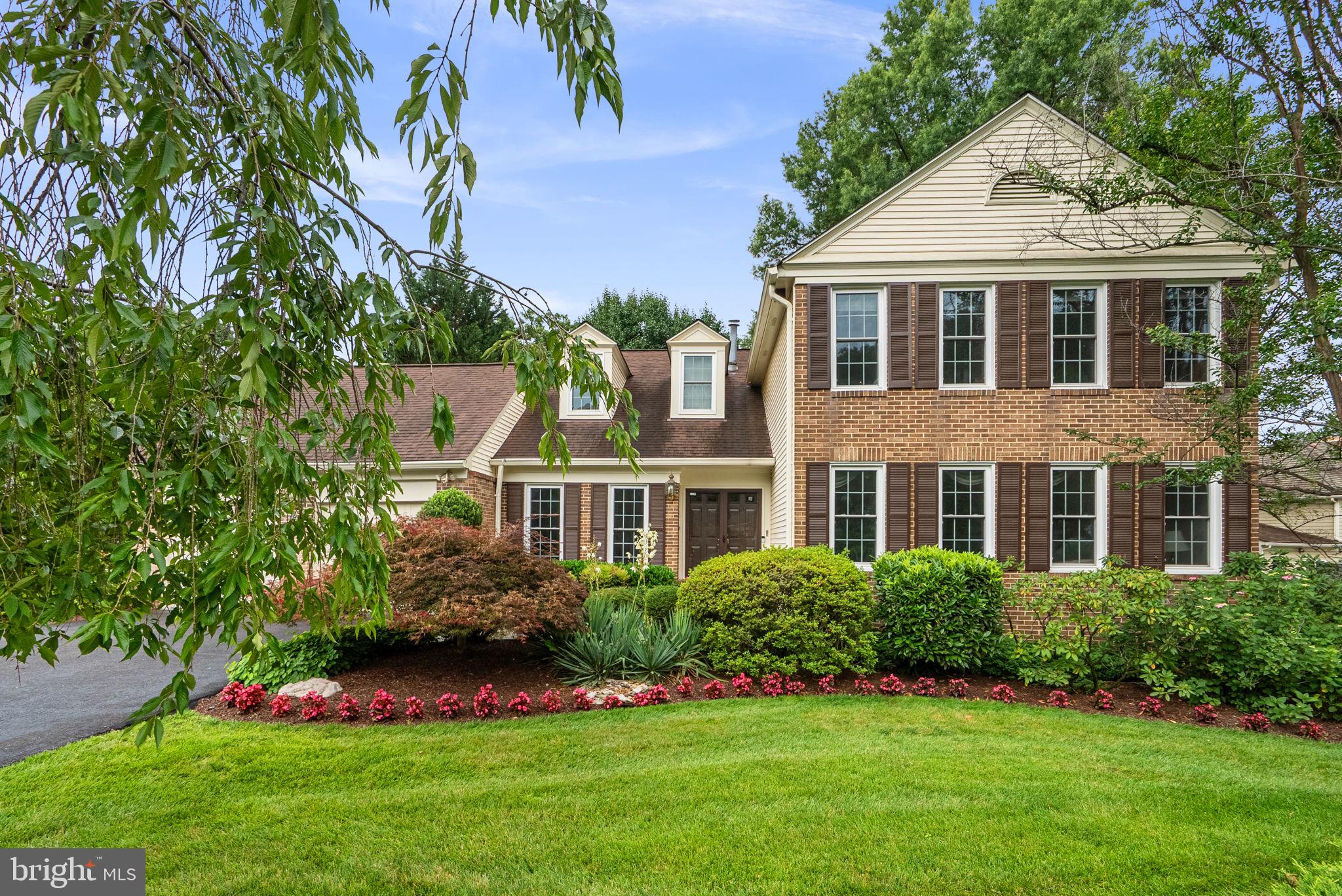 Stunning curb appeal, fabulous landscaping, and an incredible flat fenced rear yard set the stage for this exceptional 6 Bedroom, 3.5 Bath home. Beautifully maintained and thoughtfully updated, this residence offers outstanding living space across three finished levels. A lovely foyer with marble flooring welcomes you inside. The enormous Living Room showcases a wall of windows flooding the home with natural light, along with elegant crown molding. The Dining Room features hardwood flooring, crown molding, and chair railing, creating the perfect setting for entertaining. The large Family Room offers a floor-to-ceiling stone gas fireplace, recessed lighting, and two exits to the deck. The Kitchen is appointed with granite countertops, 42" cabinetry, wine cabinetry, and abundant workspace. Sliding glass doors lead to a breathtaking screened porch featuring vaulted ceilings, skylights, recessed lighting, and a ceiling fan. Overlooking one of the area's most beautiful fenced rear yards, this inviting space is perfect for relaxing and entertaining. A deck extends from the porch, providing even more outdoor living space. The Main Level also offers a versatile Bedroom/Office with a walk-in closet and built-in shelving, a Powder Room, and a convenient Mudroom/Laundry Room leading to the attached two-car garage. The Upper Level is highlighted by an expansive Primary Suite featuring a gas fireplace, sitting room, walk-in closet, and additional wall closet with custom organizers. The beautifully remodeled Primary Bath offers a double vanity, recessed lighting, large shower with frameless glass door, custom tile work, linen closet, and additional storage. Three additional generously sized Bedrooms feature ceiling fans and custom closet organizers. The walkout Lower Level provides exceptional additional living space with a large Recreation Room, Game Room, 6th Bedroom, Full Bath with shower stall, and a spacious Storage Room. Sliding doors lead to a patio and the spectacular rear yard. To top it all off, the location is simply unbeatable! Nestled on a quiet cul-de-sac in sought-after Timberlawn, this home is just moments from Strathmore Music Center, Metro, Bethesda, Pike & Rose, downtown Washington, DC, premier shopping, dining, parks, and major commuter routes. Move right in and enjoy this truly special home in one of Rockville's most desirable neighborhoods.