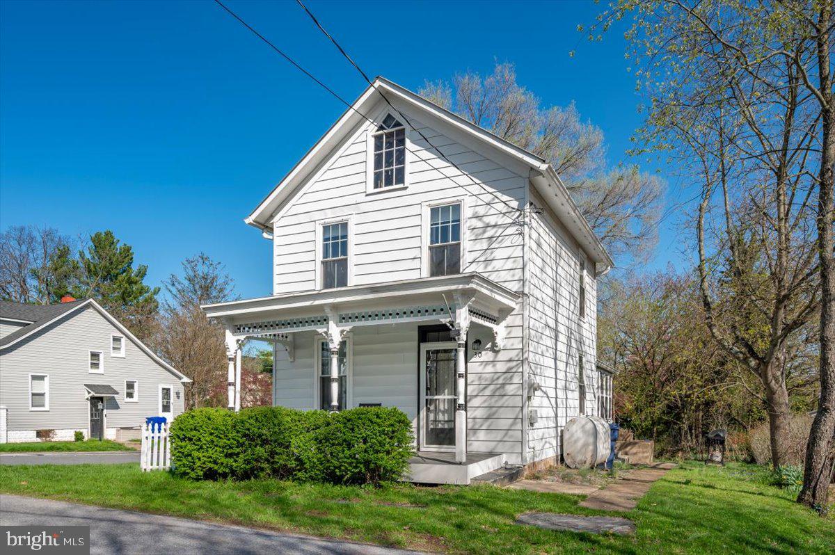 Charming bungalow with timeless character and thoughtful updates throughout. This 2-bedroom, 1.5-bath home offers a bright, open layout with abundant natural light streaming through newer windows, creating a warm and inviting atmosphere. Built in 1920, the home blends classic charm with improvements that make it comfortable for today’s living. The property features a nice-sized yard and a detached two-car garage with additional workshop space, ideal for hobbies, storage, or projects. Conveniently located just minutes from historic Gettysburg, you’ll enjoy easy access to all the area has to offer.  The sale is subject to the current lease. Open House Sat Jul 11- from 1:00-3:00.