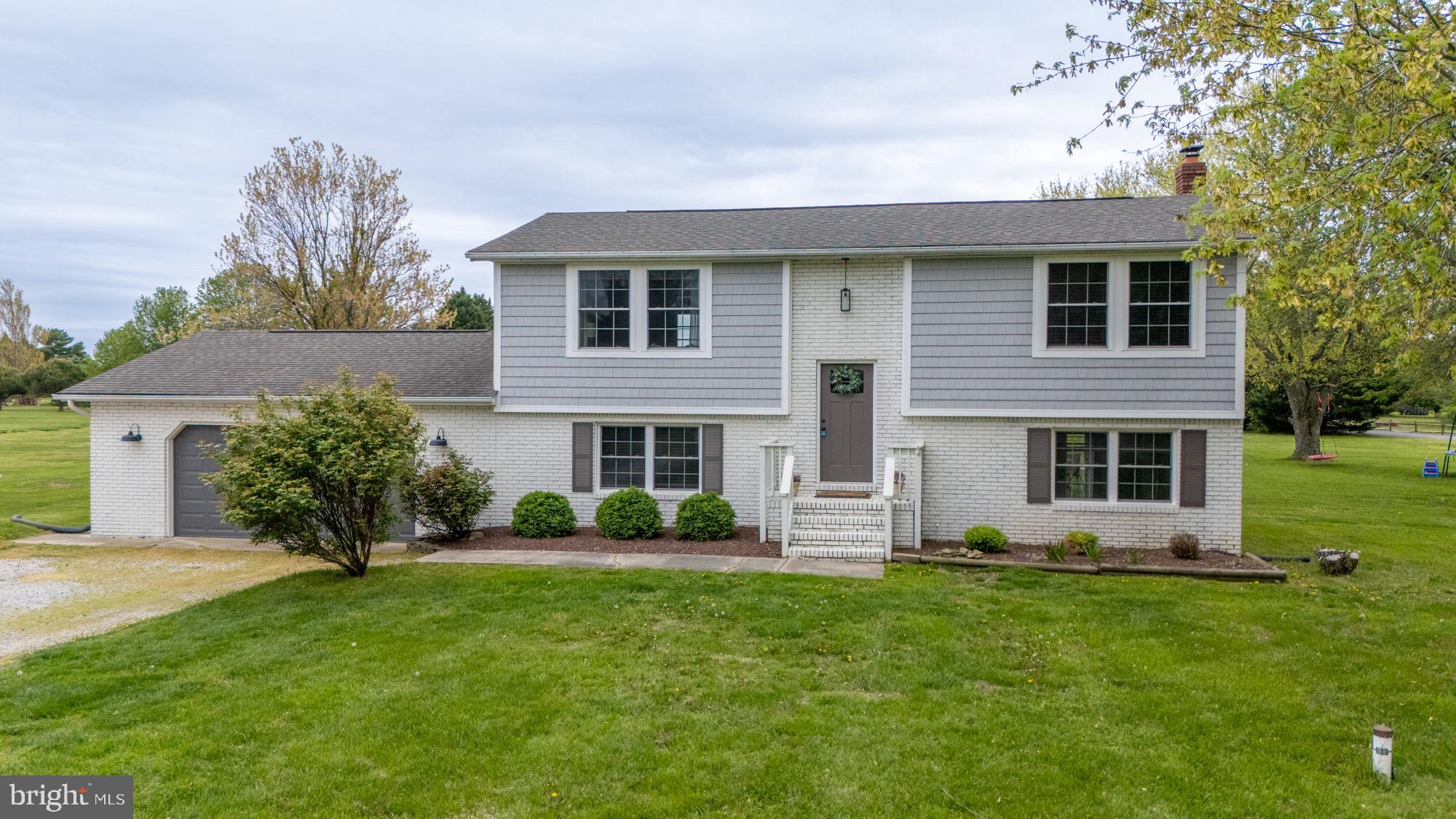 Beautifully remodeled from top to bottom in 2017, this stunning home blends modern comfort with the peaceful charm of a park-like setting. Situated on over 2 acres—a rare find on Kent Island—this property offers the privacy and space you've been dreaming of! Step inside to discover an open-concept floor plan filled with natural light. The spacious layout features 3 bedrooms and 2 full bathrooms, designed with both functionality and style in mind. Every detail has been thoughtfully updated, making this home completely move-in ready. Outdoors, enjoy expansive green space perfect for entertaining, gardening, or simply relaxing in nature. Just cross the main road to access the scenic Cross Island Trail, ideal for morning jogs, bike rides, or peaceful strolls. Whether you're looking for your forever home or a weekend retreat, 56 Long Creek offers the best of Eastern Shore living—privacy, convenience, and beautifully updated interiors all in one. Don’t miss this rare opportunity to own a slice of Kent Island paradise!