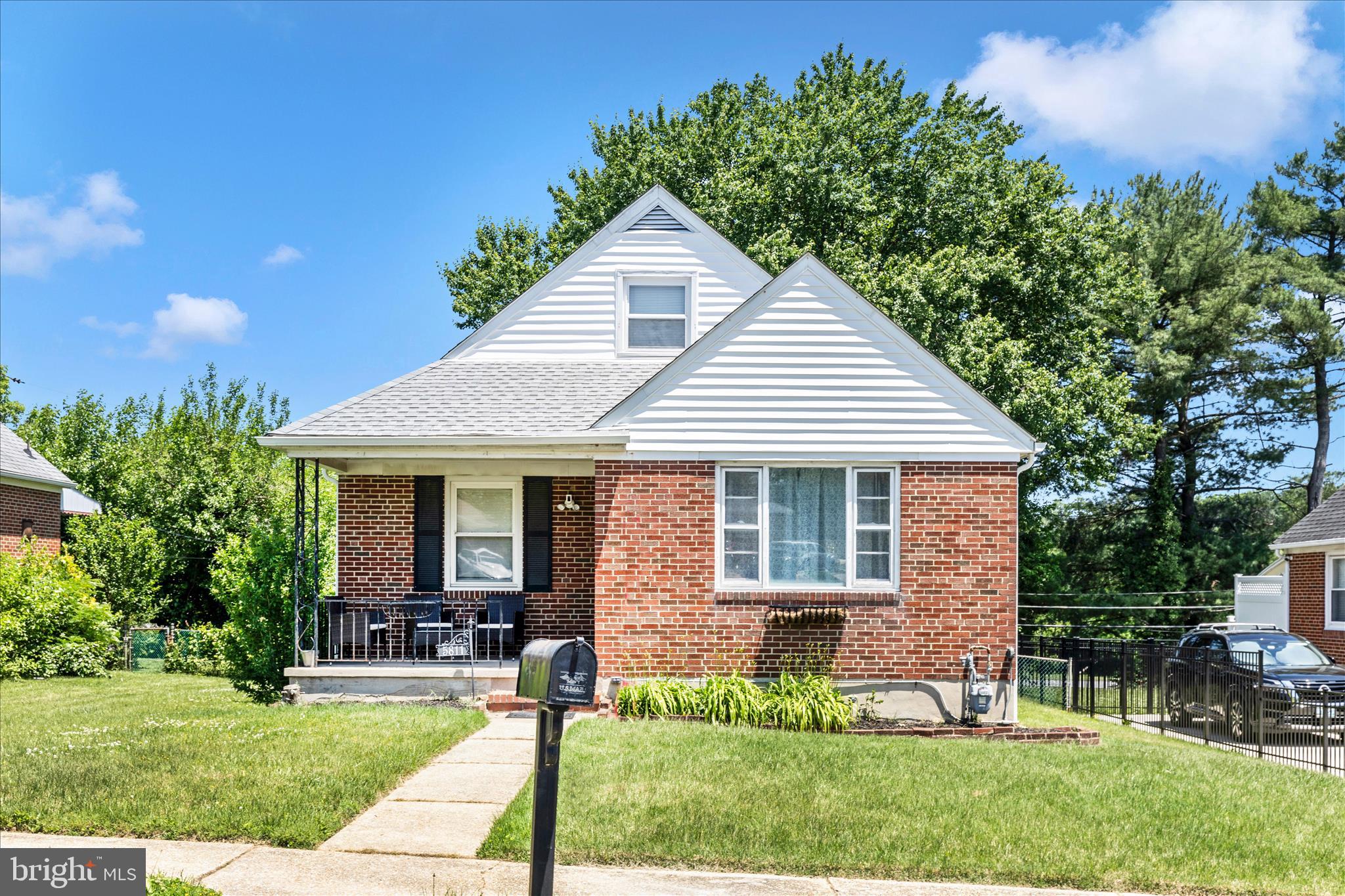 If you’re looking for a renovated in-law suite or multigenerational home in Baltimore County, look no further—this charming brick Cape Cod is ready for you! The main and upper levels feature 3 bedrooms, a full bath, a spacious living room, a separate dining room, and kitchen. The upper level has been used as the primary suite and includes a dressing area. The fully finished lower level offers a beautifully renovated in-law suite complete with a kitchen featuring quartz countertops, a cozy family room with a gas fireplace, and an additional flex space that can be used as a bedroom, office, or whatever suits your needs. Recent updates include a new roof and gutters (2026), new carpet (2026), fresh paint (2025–2026), a new screen door (2025), HVAC (2021), and the basement in-law suite renovation (2019). Enjoy the rear enclosed porch overlooking a spacious, usable yard—perfect for relaxing throughout the seasons. Conveniently located near shopping, restaurants, and major routes. Shed conveys as-is.