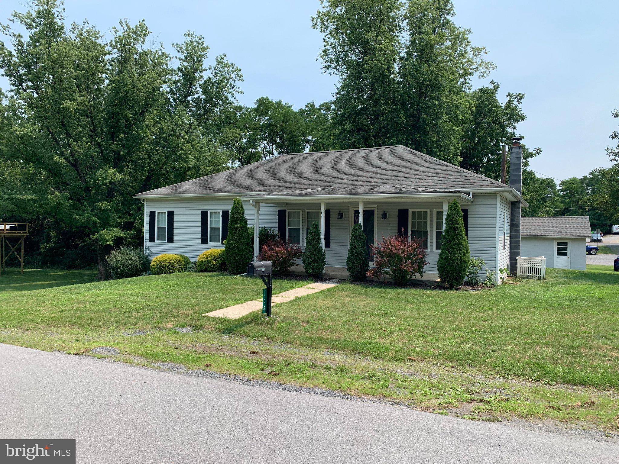 This is not welcome home but THIS is Home!! Nice quaint ranch home on corner lot with 3 bedrooms, dining room, some wood floors, full basement with interior and exterior access, large detached garage, screened-in porch, central-air and much more. Take a look today.