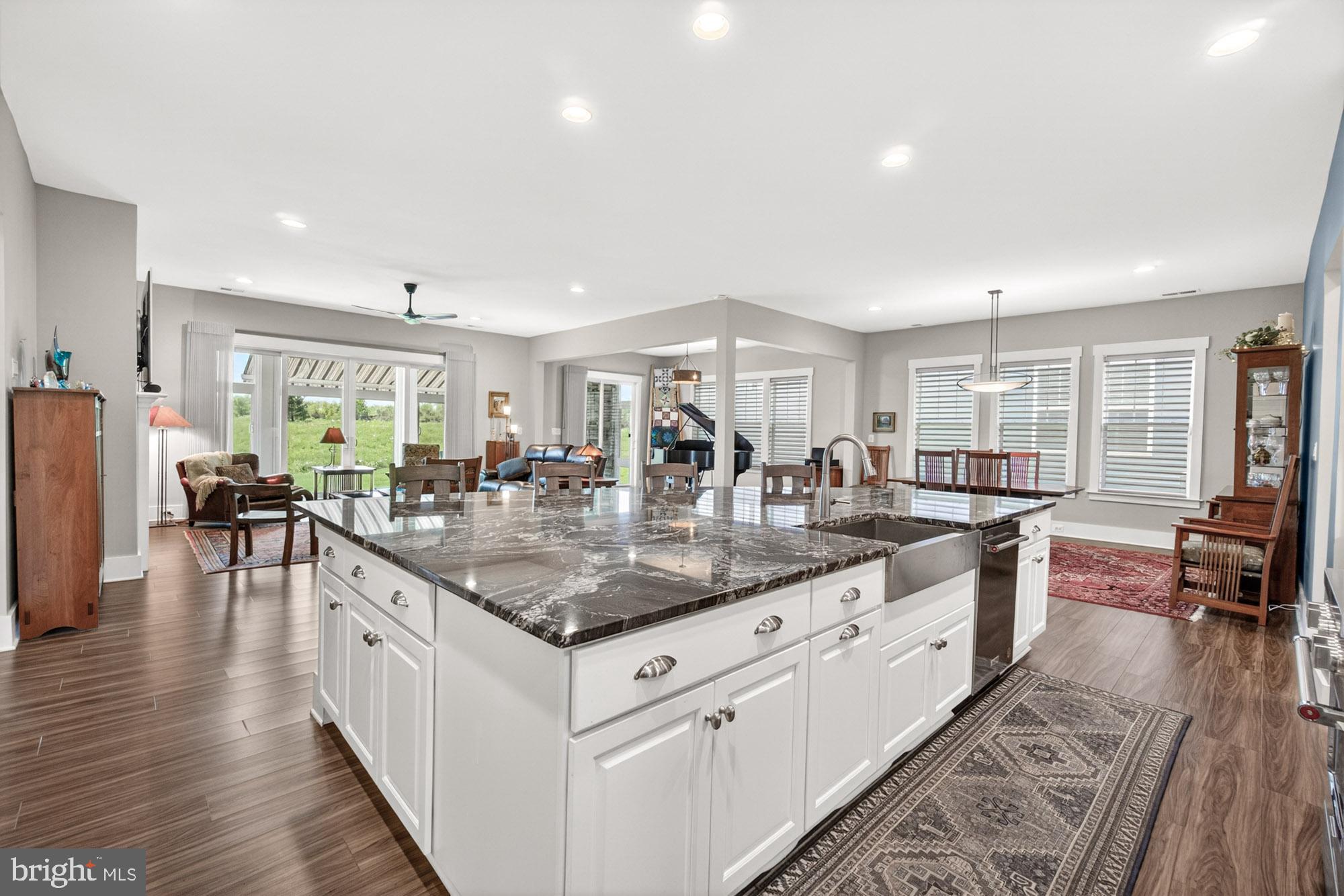 Sellers have flexibility in closing on this home. If you're trying to figure that out we can assist with it!
Featuring one of DRB’s largest homes built in the 55+ community-Amblebrook, 374 Lively Stream Way offers nearly 3,100 square feet of beautifully designed living space with an impressive list of upgrades. Backing to open space with no direct rear neighbors, this home provides added privacy and a peaceful setting.
Just off the foyer, you’ll find an office/den that offers flexibility for a home office, sitting room, or even space for a daybed. The open and inviting floor plan allows the kitchen, dining, and living areas to flow seamlessly together—perfect for entertaining and everyday living.
The gourmet kitchen showcases upgraded cabinetry, granite countertops, a gas oven, upgraded appliances, a large center island, and an oversized pantry providing exceptional storage. The spacious primary suite features a bump-out, generous walk-in closet, and additional storage room to keep everything organized and out of sight.
Wide luxury vinyl plank flooring adds both style and durability throughout the main living areas. At the rear of the home, the Four Seasons room offers the perfect place to relax year-round, complete with a corner gas fireplace and retractable awning.
Additional upgrades include premium window coverings and shutters, a top-of-the-line tankless water heater, and an irrigation system for easy lawn maintenance.
Beyond the home, Amblebrook offers an exceptional lifestyle with resort-style amenities including a clubhouse, art studio with bar and lounge, dog park, fitness center, game room, hot tub, party room, picnic areas, indoor and outdoor pools, shuffleboard, pickleball, and tennis courts.
This home truly delivers the perfect combination of space, upgrades, privacy, and community living.