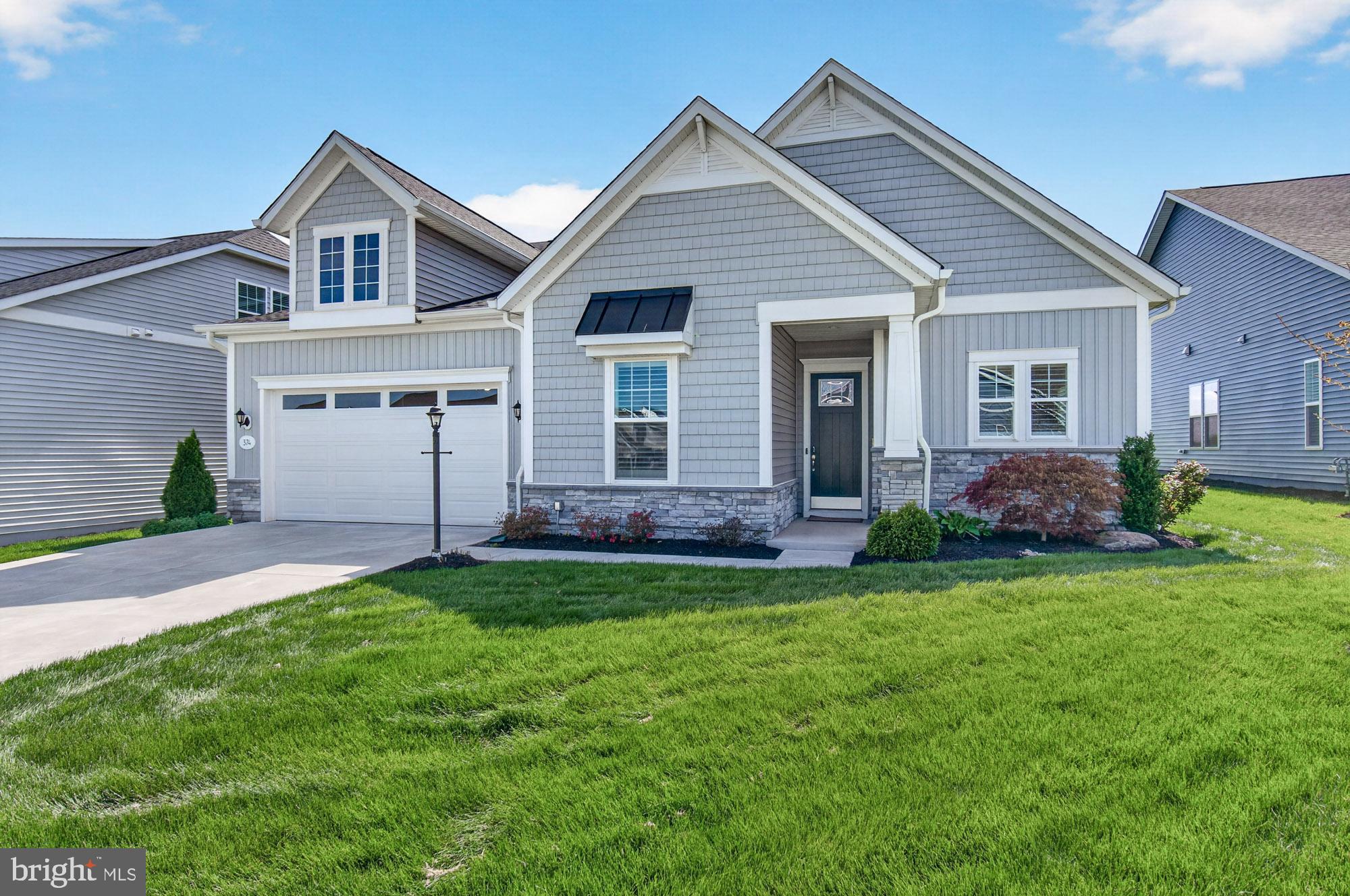 Sellers have flexibility in closing on this home. If you're trying to figure that out we can assist with it!
Featuring one of DRB’s largest homes built in the 55+ community-Amblebrook, 374 Lively Stream Way offers nearly 3,100 square feet of beautifully designed living space with an impressive list of upgrades. Backing to open space with no direct rear neighbors, this home provides added privacy and a peaceful setting.
Just off the foyer, you’ll find an office/den that offers flexibility for a home office, sitting room, or even space for a daybed. The open and inviting floor plan allows the kitchen, dining, and living areas to flow seamlessly together—perfect for entertaining and everyday living.
The gourmet kitchen showcases upgraded cabinetry, granite countertops, a gas oven, upgraded appliances, a large center island, and an oversized pantry providing exceptional storage. The spacious primary suite features a bump-out, generous walk-in closet, and additional storage room to keep everything organized and out of sight.
Wide luxury vinyl plank flooring adds both style and durability throughout the main living areas. At the rear of the home, the Four Seasons room offers the perfect place to relax year-round, complete with a corner gas fireplace and retractable awning.
Additional upgrades include premium window coverings and shutters, a top-of-the-line tankless water heater, and an irrigation system for easy lawn maintenance.
Beyond the home, Amblebrook offers an exceptional lifestyle with resort-style amenities including a clubhouse, art studio with bar and lounge, dog park, fitness center, game room, hot tub, party room, picnic areas, indoor and outdoor pools, shuffleboard, pickleball, and tennis courts.
This home truly delivers the perfect combination of space, upgrades, privacy, and community living.