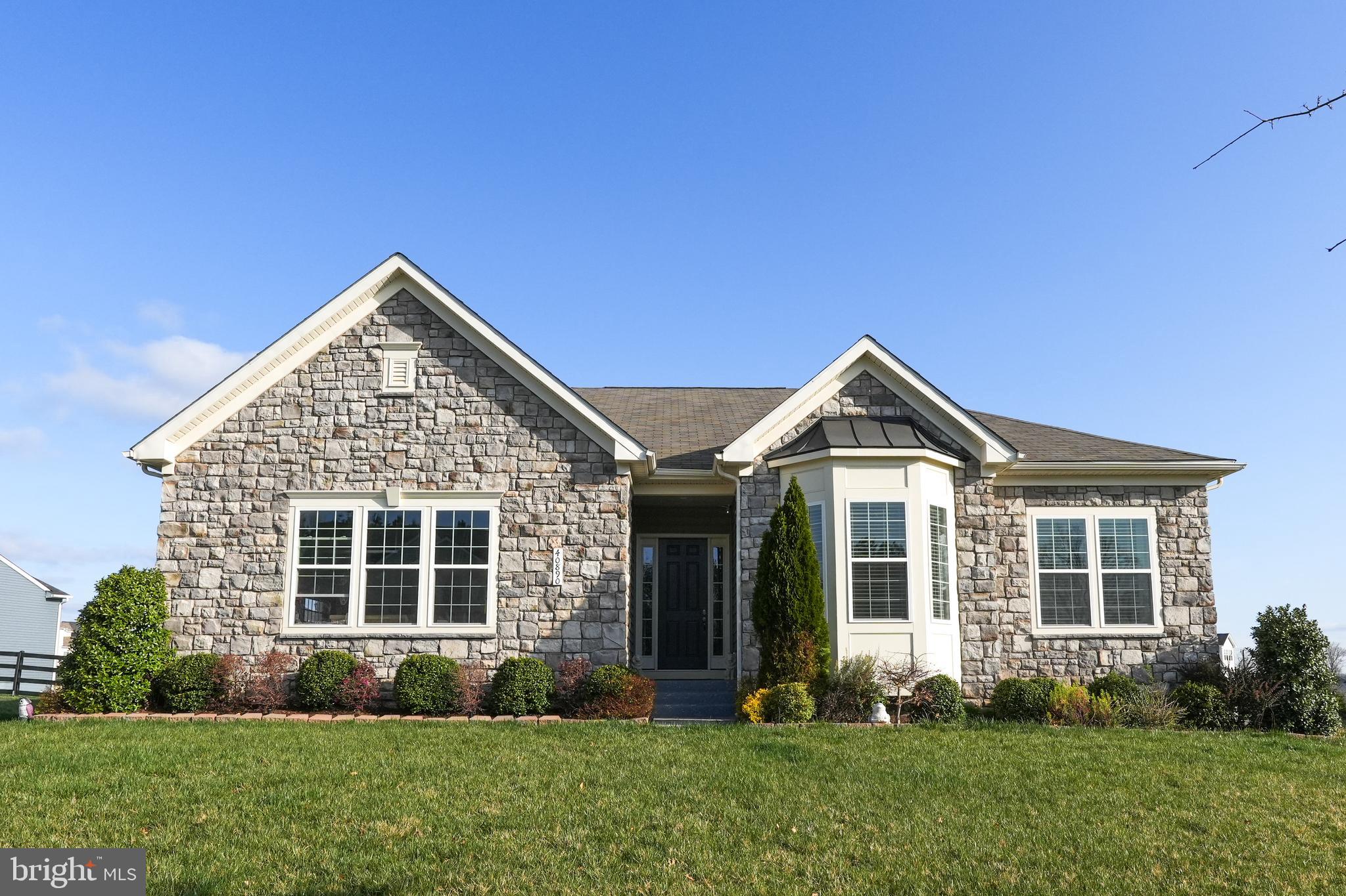 **Schedule showings online thru Showing Time, 1 hour notice required.**  Charming Forever Home nestled in the prestigious Aldie Estates!  Welcome to this stunning and beautifully maintained  6 bedrooms, 3  full bathrooms and 1 half bathroom, fully upgraded home, This stunning single family home is a modern raised rancher with all your needs on the main level.This beautiful home is well appointed with designer touches through out including hardwood floors, crown molding, upgraded lighting and an open floor plan.  As you enter the home you will see the pristine hardwood floors thru out the main level, 10 foot High Ceilings, and an open floor plan drenched in natural sunlight. Main level offers a spacious foyer, large living room with gas log fireplace, a gourmet kitchen with large island, and beautiful and upgraded kitchen with Quartz counter top and stainless steel appliances. Main level has 4 bedrooms and 2 full bathrooms. Primary bedroom features a spacious walk-in closet and a gorgeous upgraded bathroom. Dine with the family and friends in the designated dining room area off the kitchen which offers lots of natural light, large windows and vaulted ceiling. The lower level is a full finished basement with expansive bar area permitted for kitchenette, with large permitted 2 bedrooms and a full bathroom.  A walk-out door to a beautiful Patio. 
Enjoy the walking trails and a pond with in the neighborhood. Immediate off Rt 50, 8 minutes from all schools. Close to Stone Ridge Village Center, Gum Spring Library, Dulles Airport, Golf Courses, Parks, Restaurants, INOVA health care, Winery's and Breweries.