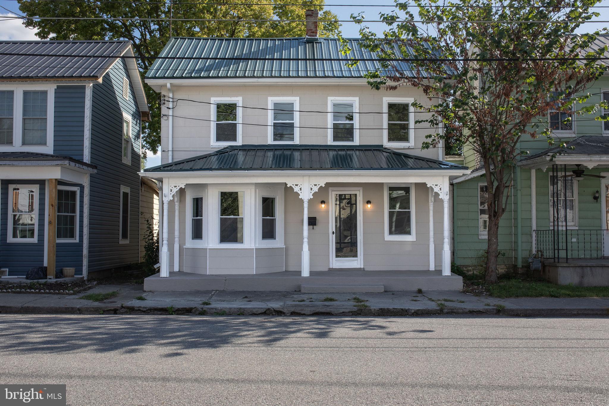 Stunning Two-Story Gem in a Tranquil Up-and-Coming Neighborhood!  Nestled in a peaceful corner of town, just behind the senior center in the "nice" section of East Race St, this newly renovated two-story residence is the embodiment of modern comfort and style. With three bedrooms, one and a half bathrooms, and a delightful backyard retreat, this property offers the perfect blend of contemporary living.

Renovations on this home spared no expense.  From the new metal roof to the new plumbing and everything in between, this house was completely remodeled and upgraded.  New upgraded 200 amp electric service was installed as well as a new HVAC system.  A brand new half bath and laundry room were added to the main level and the upstairs main bathroom was totally replaced with new modern amenities.  Recessed lighting, LVP flooring and new carpet are just some of the other new upgrades.  All of this was done while keeping the charm and craftsmanship of old.  All of this is under a NEW ROOF and new double pane energy efficient windows.  Off street parking in the rear of the property in your own little parking lot adds even more to this charming home.