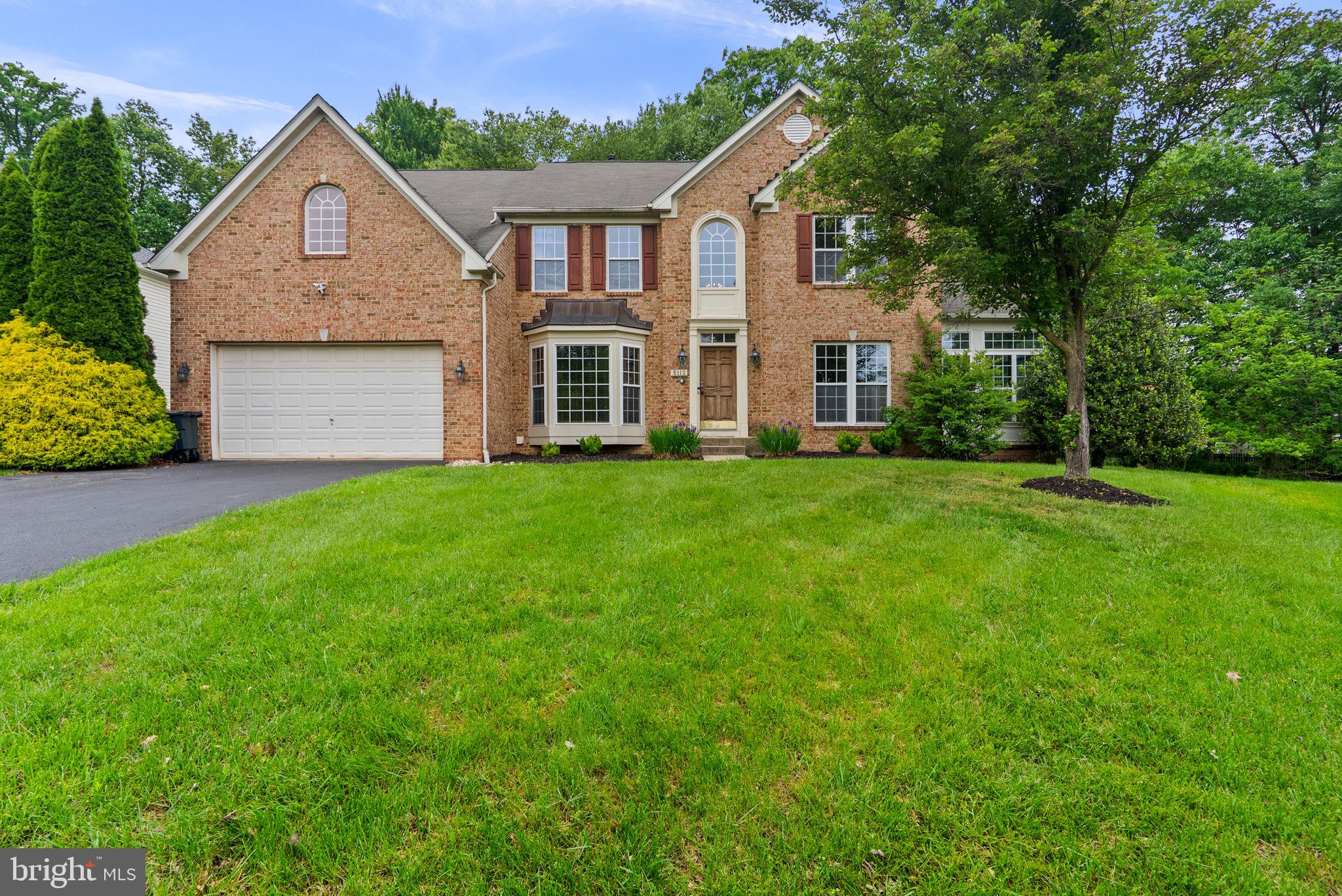 Welcome to 5112 Kellan Drive in Ellicott City! Nestled in a quiet community, this spacious and beautifully maintained 5-bedroom, 2 full and 1 half bath home offers nearly 4,000 finished square feet above grade, plus an expansive walk-up basement with endless potential. Step inside the impressive two-story foyer, flanked by a formal living room and private home office. Brazilian cherry hardwood flooring flows throughout much of the main level, adding warmth and elegance. The heart of the home is the expansive kitchen featuring cherry cabinetry, stainless steel appliances, double ovens, pantry, tile backsplash, and a sun-filled morning room. Just off the kitchen, the oversized family room with a cozy gas fireplace and secondary staircase creates the perfect gathering space for entertaining and everyday living. The formal dining room and huge sunroom provide additional flexible living space and overlook the private yard. A convenient laundry/mudroom and powder room are located just off the attached two-car garage. Upstairs, you’ll find five generously sized bedrooms and two full bathrooms, including a versatile oversized bedroom that could easily serve as an upper-level family room, playroom, or second office. The expansive primary suite features tray ceilings, a sitting area, walk-in closet, and plenty of room to unwind. The unfinished walk-up basement has already been framed and includes a gym area, bathroom rough-in, kitchen rough-in, and abundant space for future recreation, entertaining, or storage. Ideally located close to shopping, dining, commuter routes, and top-rated Howard County schools, this exceptional home combines space, functionality, and opportunity in one of Ellicott City’s most desirable locations.