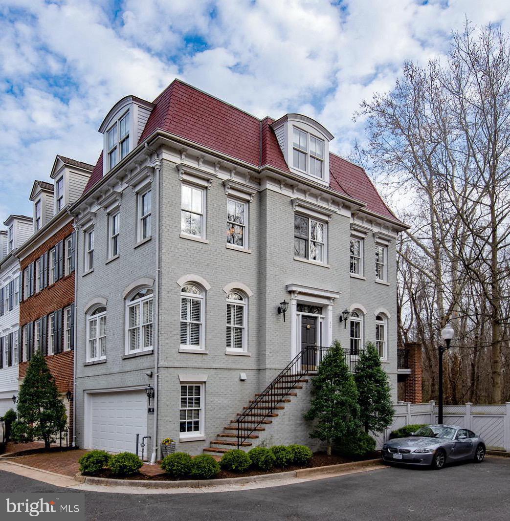 Curb appeal galore in this glorious end unit in sought after Ford's Landing.  This neighborhood  was just named the hottest neighborhood in Old Town Alexandria.  Hardwood floors on all four levels. This sunny, three bedroom, 2 full and 2 half bath royal model has a mansard roof and three sides of light and view of the woods.  One of only two royal models in the neighborhood with two areas of outdoor living.  Updated master bathroom, kitchen, new carpeting, flooring make this a true retreat.   Enjoy parking your car in your two car garage after a long day of work.   Residents enjoy use of the boardwalk, proximity to King Street shops and restaurants, and the Mt. Vernon trail. **Final sales price reflects current condition of the property.