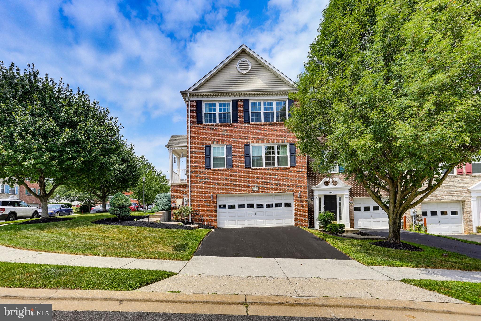 Welcome to 4607 Ashforth Way, a spacious end-unit all-brick townhome nestled in the desirable Lyons Gate community of Owings Mills. Offering 3 bedrooms, 3 full baths, 1 half bath, and an attached 2-car garage, this well-designed home features three finished levels of comfortable living space.  

Property highlights include the end unit advantage and a very well-maintained green space, including professional landscaping with lighting and a built-in sprinkler system for low-maintenance lawn care.  Over 2,000 square feet of living space spans three finished floors throughout the home, which also includes a sought-after attached 2-car garage and indoor sprinklers for added security.   

Step inside to the bright and inviting main level with an open concept leading you through the living and dining room. The updated kitchen is equipped with Quartz countertops, abundant cabinetry, and a sliding glass door that leads to the rear deck—perfect for morning coffee, outdoor dining, or entertaining guests. A convenient powder room completes the main level.  

Upstairs, the vaulted-ceiling primary suite provides a relaxing retreat with a walk-in closet and a private en-suite bath featuring a double vanity. Two additional bedrooms upstairs share a full hall bath, while the upper-level laundry adds everyday convenience.  

The finished walk-out lower level offers a spacious recreation room with endless possibilities for a family room, home office, hobby space, or home gym. An additional full bath and direct access to the backyard provide added flexibility, while interior access to the attached 2-car garage completes this level. 

Ideally located just minutes from Foundry Row, Metro Centre at Owings Mills, Mill Station, and the Owings Mills Metro Station. Outdoor enthusiasts will appreciate nearby Northwest Regional Park, while commuters will benefit from quick access to I-795 and I-695. This exceptional home offers the perfect combination of space, convenience, and location.