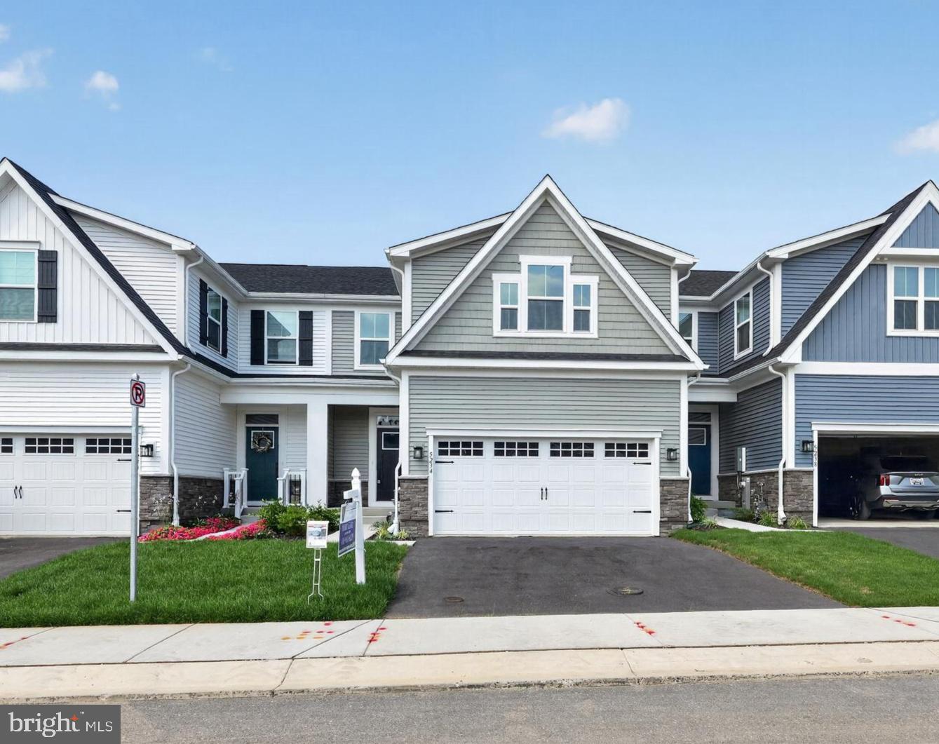 IMMEDIATE DELIVERY! NEWLY COMPLETED HOME NEVER LIVED IN! Agents - check the comps. The unit next door sold for $714K - same floorplan, same square footage. $100,000 lot premium - This is the only lot currently available that backs to open space and Liberty Reservoir. Welcome to Nell's Acres 55+ Villas, an active adult community. This stunning home, the Caroline model, offers main-level living featuring a first-floor owner's suite with dual vanities and walk-in closet, custom interior design with over $60,000 in upgrades and builder options,  a two-car garage, four bedrooms and 2.5 baths, a gourmet kitchen with an oversized quartz-topped island, a private home office and ample storage space, and a fully finished lower level with recreation room, 4th bedroom and full bath offering a total of 2,800 square feet of finished living space. Seller agrees to credit the Buyers for a washer, dryer, & refridgerator with an acceptable offer. 
Also included is a covered, screened porch to take in the tranquil setting of the wooded homesite backing to forest conservation. Located in Carroll County's most sought-after location, Sykesville, Maryland, the community offers private homesites with wooded views and features a clubhouse, walking paths, and low-maintenance living, which means no more mowing, yard maintenance, or snow removal.
The area is within minutes of everything you need: shopping, restaurants, recreation, and medical care. These amenities make life easier and provide peace of mind, plus there is easy access to Route 26, Route 32, and I-70, making it easy to get wherever you want to go.