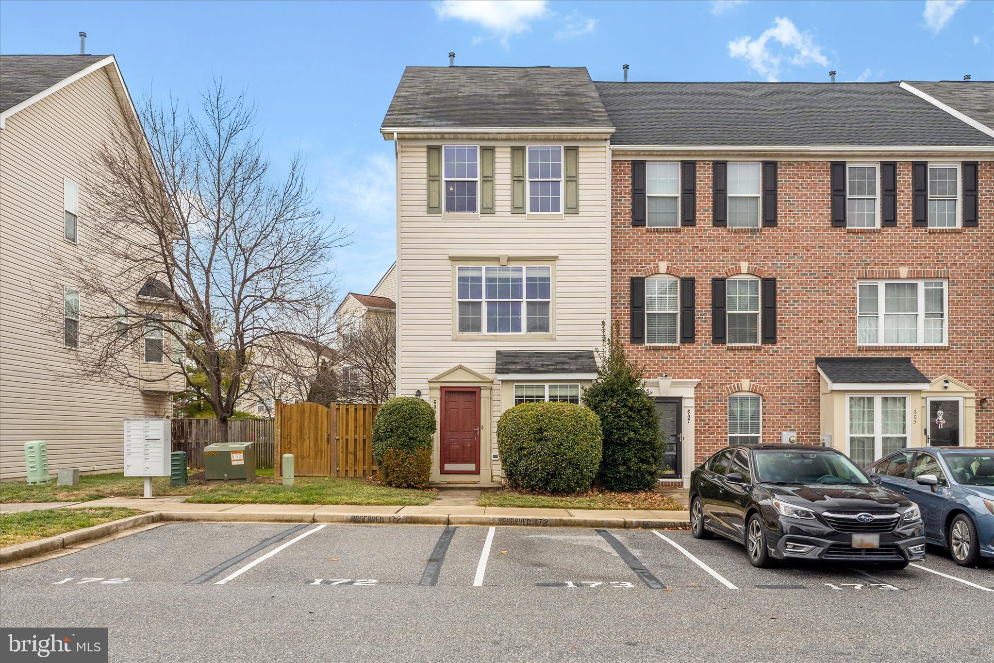 Adorable end unit townhome situated close to major commuter routes like 270 and 70, is move in ready!  Bright and light filled, walk into the main level with coat closet, living area  and  eat-in kitchen with walkout to extended fenced backyard.  Enjoy summer evenings as the light filters through the trees on the back patio. Kitchen is large with plenty of counter space for meal preps, storage for all your cooking and baking needs, and a large pantry.  On the second level you'll find one bedroom, a full bath, laundry, and another large but cozy living space with fireplace and bay window. HVAC system + water heater replaced in 2022.
The top level provides two bedrooms and a Jack and Jill full bathroom with double sink, tub and separate shower and linen closet. The larger bedroom is located on the back of the home for quiet and privacy.  
Two assigned parking spaces and plenty of visitor parking is available in the neighborhood!  With Wawa right down the street, CVS at the corner and local eats all very close, you'll never have to go far for an errand.