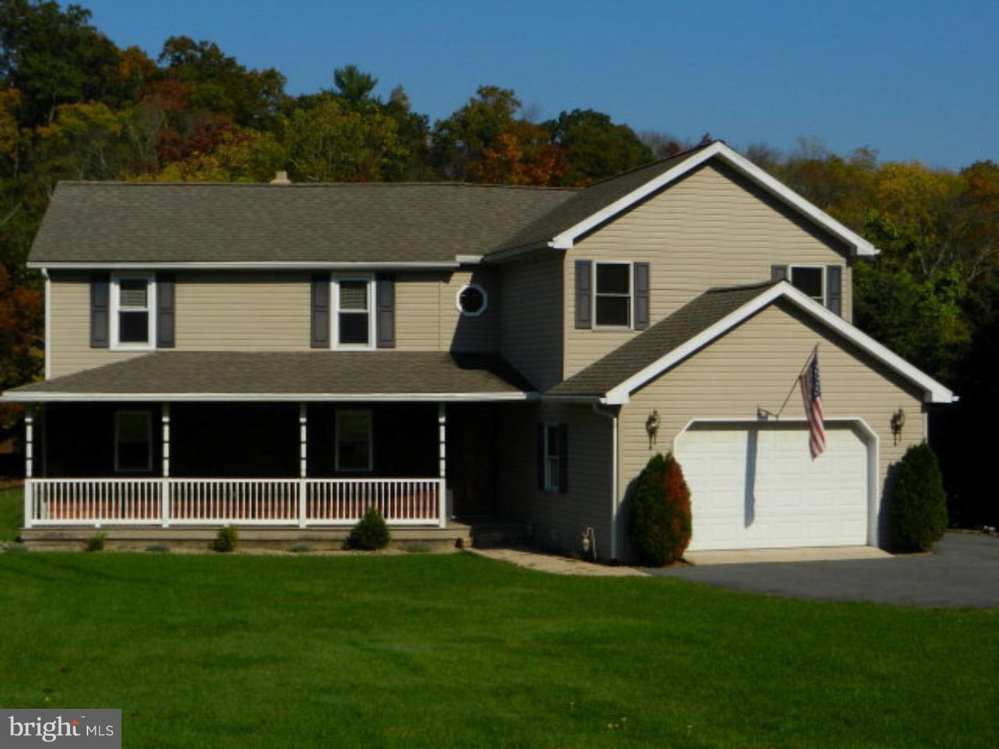 New Price! Country Living at Its Best on 2.1 Acres ! Large Deck inc quiet Side Yard newer hot tub overlooking Stream  Newly Constructed Bridge leads to Meadow and Woods ! Original Home Built in the 1800's and Completely updated in 2000 showcases original ceiling wood beams . 2 Staircases lead to Airy Bedrooms, Master boasts Walk In Closet additionally Larger Bedroom features On Suite Bath/Large Closet. Great Room fitted with TV display cabinet with Surround Sound Speakers   Warm those cold winter nights by the Propane Fireplace while enjoying a cocktail at the Built-In Bar! Pride of Ownership!