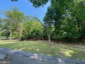 1.73 acre secluded, wooded building site in the Borough of Lewistown. Borders Woods Lane (privately maintained section) and Ridge Road (in Granville Township).  Electric runs through the property and is accessible.  Sewer main is on property with a $2,000 tap on fee to Lewistown Borough.  Buyer will need to drill a well, no well permit required per Lewistown Borough.  This is a gem of a building site, located between 2 majestic homes built many years ago, on a no outlet street.  Enjoy the convenience of the location with the feel of a rural setting.