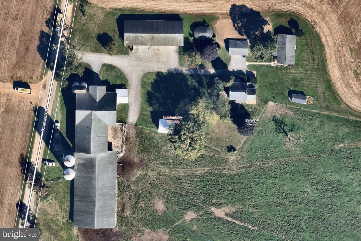 46.7 Acre Dairy/farm near Cochranville, PA. Farm has 2 houses, a 5-bedroom, 1/12 bath 2 story house including full basement with outside entrance and a 1 story 3-bedroom, 2 bath house. There is a 72-stall bank barn, 2-20'x70' metal silos and 2-12'x50' concrete stave silos, 130'x64' attached heifer barn, 100'x36 ' machine shed with corn cribs on both ends, detached drive through corn crib and detached three car garage. Property has 30 tillable acres of gently rolling farmland. 12 acres of meadows with 5 strand high tensile fencing, pond, stream and 11/4 acres of woodland. Property is leased for 2026. There is a Ag conservation easement with the Chester CO. Ag Preservation Board. Property is in Act 319 (clean and green)