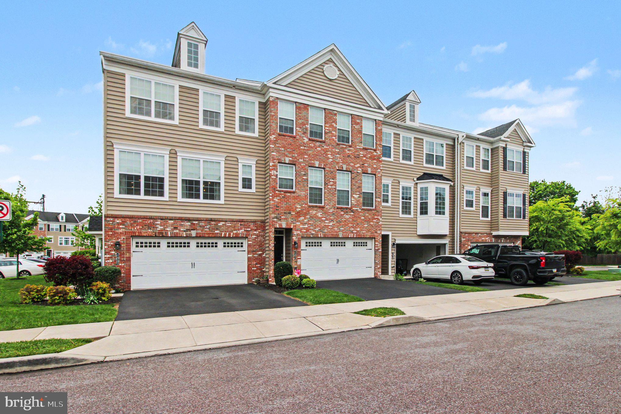 Welcome to this wonderful end unit townhome that features 3 bedrooms, two and a half baths and a two car garage. When you enter the lower level you will find a greeting foyer that leads to the family room with a sliding door to a concrete patio, huge closet and access to the utility room and the garage.  Moving up to the main level you will be presented with a sun lit living room , a large kitchen with abundant counterspace, a new microwave oven and dishwasher, center island and a breakfast bar with seating for three. Just off the kitchen is a large dining area with sliders to a nice sized deck. This level is also where the powder room is located. The upper level features the main bedroom with a full bath that features a double bowl sink and a walk in shower. There is also a walk in closet. This level also features a full hall bath, 2 additional bedrooms and a convenient laundry room. Enjoy this end unit that boasts plenty of natural light,  2 car driveway parking and plenty of additional parking for guests. Make your appointment today.