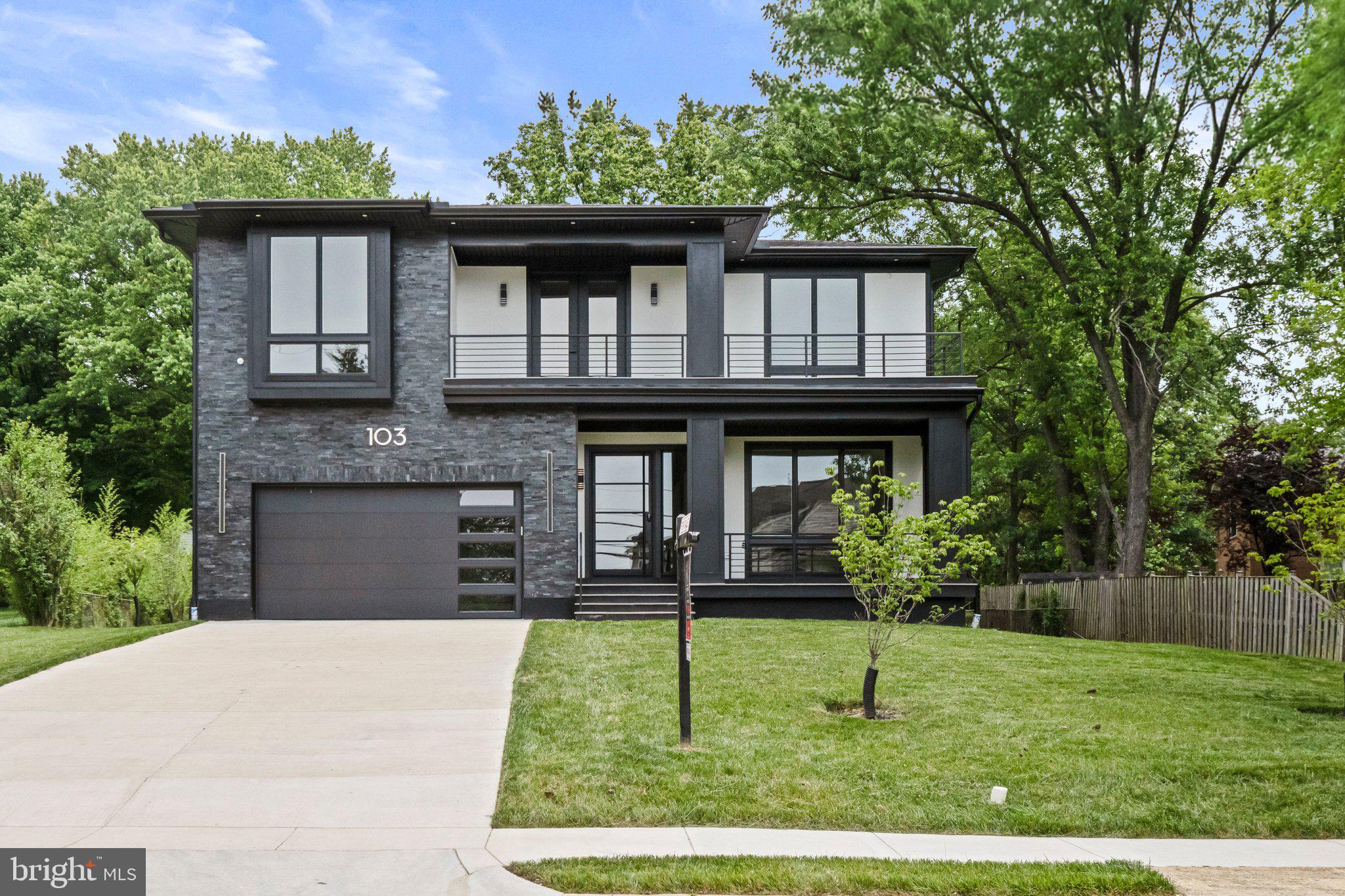 Discover exceptional craftsmanship and modern luxury in this stunning custom-built estate, offering 7,619 square feet of beautifully designed living space on a private 0.54-acre homesite. Thoughtfully created for both comfortable everyday living and sophisticated entertaining, the home features soaring 10-foot ceilings on the main level and 9-foot ceilings on the upper and lower levels, creating an airy, light-filled environment throughout.
The main level showcases elegant gathering spaces, including a formal dining room connected to the gourmet kitchen by a well-appointed butler's pantry. Designed to impress, the chef's kitchen features premium Thermador appliances, custom cabinetry, an oversized center island with seating, and a bright breakfast area overlooking the backyard. The adjoining family room serves as the heart of the home, highlighted by a gas fireplace and seamless access to a covered rear porch, perfect for indoor-outdoor living and entertaining.
A private main-level guest suite with a walk-in closet and ensuite bath offers comfort and flexibility for visitors or multigenerational living. A stylish powder room and spacious two-car garage complete the main floor.
The upper level is anchored by a luxurious primary suite designed as a true retreat. The suite features dual walk-in closets, including an impressive dressing room with a center island, and a spa-inspired bath with premium finishes. A generously sized secondary suite provides the comfort and privacy of an additional primary bedroom, while two additional bedrooms each enjoy their own ensuite baths. A convenient laundry room and a dramatic vaulted family lounge with balcony access add versatility and functionality to the upper level.
Designed with entertaining in mind, the finished lower level offers an expansive recreation room centered around a modern electric fireplace and complemented by a sleek wet bar. This level also includes two additional bedrooms with private ensuite baths, a dedicated media room, a powder room, and a large flexible space that can be tailored to suit a fitness studio, golf simulator, home office, playroom, or other lifestyle needs. Engineered hardwood flooring, designer finishes, illuminated mirrors, elegant tilework, and LED staircase lighting enhance the home's refined aesthetic throughout.
Situated on more than half an acre, the property offers a spacious backyard with endless possibilities for customization, whether envisioning a future pool, outdoor kitchen, entertaining terrace, or expansive lawn for recreation and relaxation.
Ideally positioned for commuters, the home provides convenient access to Chain Bridge Road, I-495, I-66, the Dulles Access Road, Metro stations, Maryland, and Washington, D.C., making travel throughout the region effortless.
Located just minutes from the vibrant destinations of Vienna and Tysons, residents enjoy close proximity to upscale shopping, acclaimed restaurants, entertainment, and everyday conveniences. Nearby Westwood Country Club offers an exceptional lifestyle experience .
Combining timeless design, exceptional quality, and an unbeatable location.A rare opportunity to own a distinguished new construction home in one of Vienna's most desirable neighborhoods.
