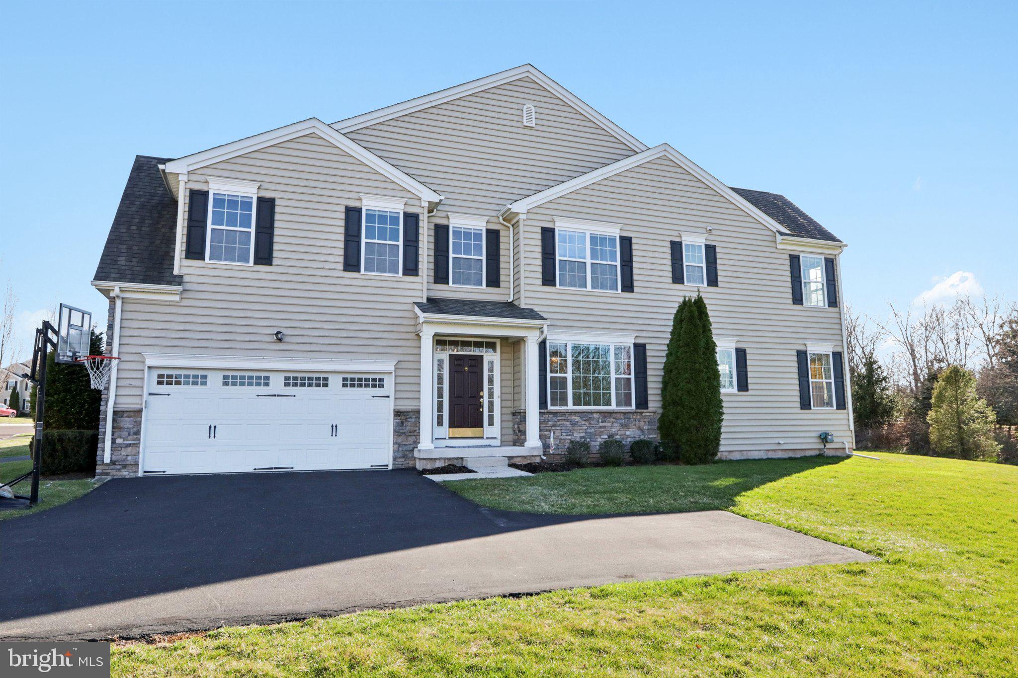 An exceptional opportunity awaits in the highly desirable community of Thorndale, where rarely available Luxury End-Unit is available.  This largest-model carriage home features nearly 4,000 square feet of beautifully maintained living space, offering the scale and presence of a single-family home with the ease of low-maintenance luxury living.
Less than 12 years old and meticulously cared for, this stunning 4-bedroom, 3.5-bath home showcases quality craftsmanship, timeless finishes, and a thoughtfully designed layout ideal for both everyday comfort and elegant entertaining. A covered side entrance welcomes you into a gracious foyer and an open concept. enhanced by hardwood flooring, crown molding, and abundant natural light.
At the heart of the home is a gourmet kitchen featuring a large granite center island, expansive granite countertops, 42-inch high-end cabinetry, newer stainless-steel appliances, pantry storage, and a sunlit breakfast area. A glass-paneled door leads to the serene rear patio, creating the perfect setting for outdoor dining, morning coffee, or relaxing evenings overlooking scenic surroundings.
The main level continues with beautifully connected living spaces, including a refined formal dining room and an inviting family room.   A spacious private office with a closet offers exceptional flexibility and can easily serve as optional main-level bedroom. Additional conveniences include a powder room, coat closet, and direct access to the attached 2-car garage, complete with built-in storage.
Upstairs, the luxurious primary suite, complete with a tray ceiling, two expansive closets including a walk-in, and a spa-inspired bath featuring dual vanities, an oversized walk-in shower, and a private water closet. Three additional generously sized bedrooms complete the second level, including one private ensuite bedroom with its own full bath and walk-in closet, while the remaining two bedrooms share a beautifully appointed hall bath. A second-floor laundry room with full-size washer and dryer adds everyday convenience.
The finished basement provides approximately 1,000 square feet of versatile living space, ideal for a home theatre, fitness studio, recreation lounge, media room, or entertaining area. 
As a premier end unit, the property enjoys added privacy and extra windows that fill the home with natural light, creating the ambiance of a standalone residence.
Thorndale residents enjoy a comprehensive HOA lifestyle with all services included, even snow removal up to the front door, which allows for a truly carefree experience.  Perfectly positioned on a premium lot, this home is within walking distance to the new shopping center, Planet Fitness, Towamencin Township Park, and scenic walking trails, with convenient access to shopping and dining options.  PA Turnpike Exit 31 is just a few miles away, offering exceptional commuter convenience while preserving the quiet appeal of this sought-after neighborhood.  Located in the highly acclaimed North Penn School District, this distinguished residence offers a rare blend of luxury, location, and lifestyle.