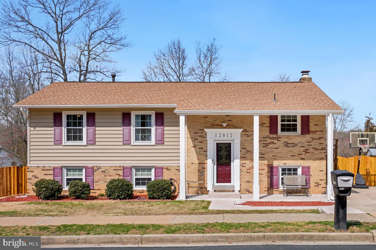 This meticulously maintained home  ideally located in the heart of Lake Ridge.   Just a couple minutes to Tacketts  Mill and the commuter parking lots on Minnieville, Horner and Old Bridge Road with  very easy routes to I95 and the express lanes.  Pride in ownership really shows throughout this home and  features 2 finished levels with over 2000sf of living space. It is no wonder why  several of the bedrooms are ample enough for a king size bed. The main level boasts an open family room, separate dining room,  the kitchen has brand  new stainless steel appliances and walk out to rear yard. The primary bedroom has recently upgraded full bath and 2 closets.  The lower level includes a finished rec room  with new carpet and storage closet, large utility/laundry room with work bench, and the 4th/5th bedrooms.  The 5th bedroom has a walk-in closet and fireplace.  Step outside  from the main level dining room  onto the recently updated composite deck or from the lower level to recently updated concrete patio and walkway to the above ground swimming pool with sundeck. The rear yard is fully fenced with new gate and has lots of space to run around.   Some  recent updates include appliances, the  hot water heater, attic insulation, the  attic fan, and most flooring.  The roof, siding and windows are less than 10 years old.  There is so much more to this sun-filled home that you surely don't want to miss.