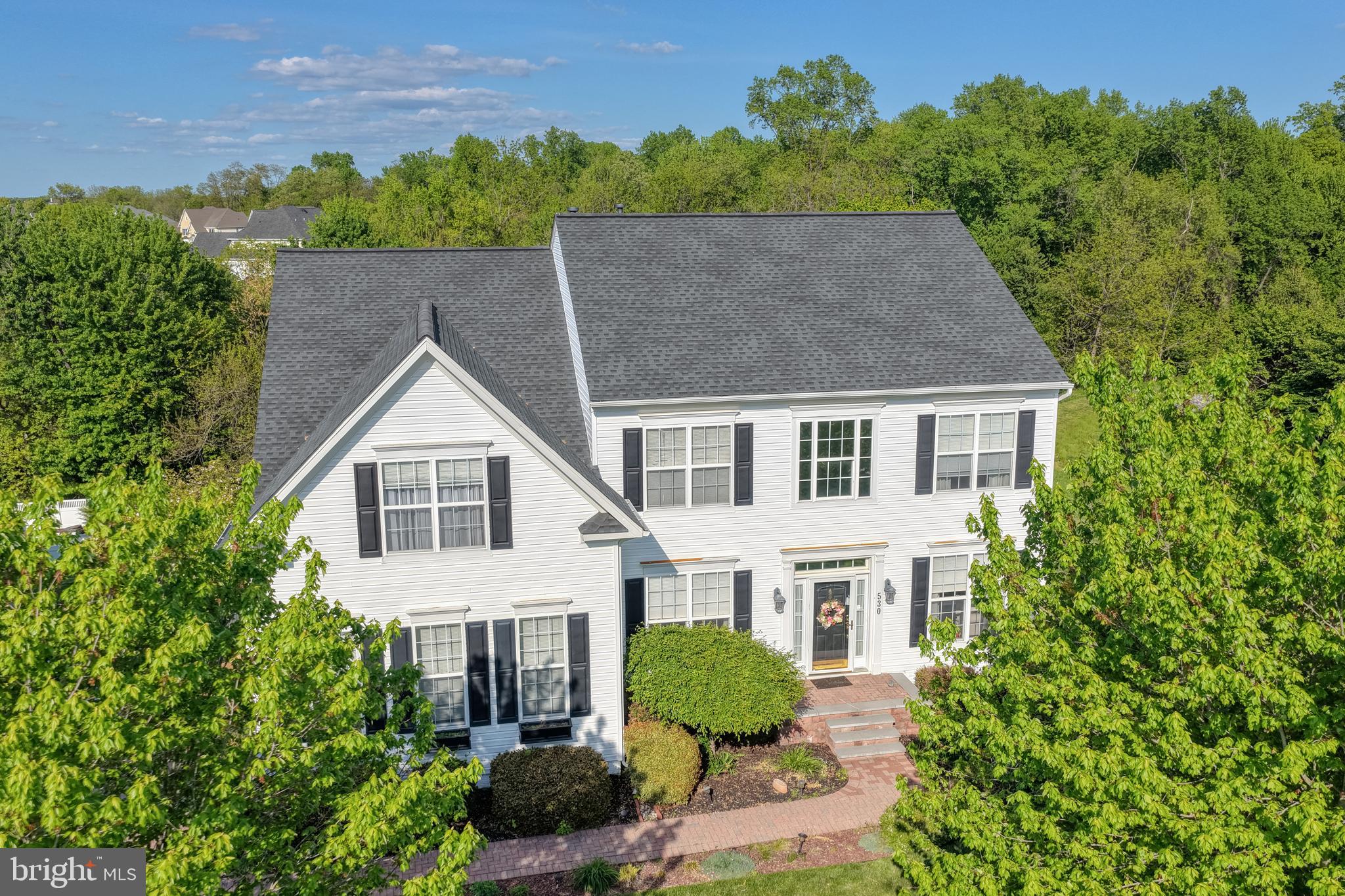 Your Dream Home Awaits in the Appo School District!
This stunning six-bedroom showcase beauty—including two with private ensuite baths—offers all the space, comfort, and elegance you’ve been searching for in your new home, with over 2,700sf plus an additional 1,100sf of grand living space in the private finished basement. There’s room for everyone in this beautiful home - especially if you're looking for multi-generational living. These rooms give you freedom to have a study, library, craft space, office or whatever your heart desires. Located in Shannon Cove, which has long been a sought-after neighborhood in the Appo School District, with it's miles of tree-lined, wide paved streets with sidewalks, grand entrance and a large in-ground community pool with tot lot and a baby pool.  
Situated on a serene lot next to bonus open space, this home delivers peaceful views from nearly every window. Whether you’re sipping your morning coffee in the primary suite’s sitting area, cozying up by the gas fireplace, or unwinding on the vaulted screened porch that flows onto an airy deck, every day here feels special.
Step inside to a grand two-story foyer framed by gleaming hardwoods, crown molding, and a gracious formal dining room just perfect for hosting holidays or quiet evenings. The impressive family room with a tray ceiling, built-ins book shelves, and a gas fireplace is an ideal backdrop for movie nights and gatherings. And it opens to the gourmet kitchen with large eat-in area so everyone can be part of the fun and enjoy the glow of the fireplace.
Love to cook? You’ll fall in love with the gourmet kitchen featuring top-tier stainless appliances, upgraded cabinetry with molding and end panels, butlers pantry, granite countertops, double wall oven, an oversized island with gas range, and bright lighting throughout. The open floor plan keeps everyone connected, and just off the kitchen sits the first-floor in-law suite, complete with ensuite bath and peaceful backyard views.
Up the turn staircase, you’ll find five spacious bedrooms, each with generous closets and ceiling fans. The primary suite is a true retreat with its vaulted ceiling, expansive sitting area, and spa-like bath with soaking tub and separate shower.
And the surprises don’t stop there—head downstairs to a huge finished basement with laminate flooring, a workshop area, abundant storage, and a long counter space perfect for hobbies, crafts, or entertaining. A set of French doors leads you to a charming brick walkway surrounded by lush landscaping—your private garden oasis. This basement has full light and a separate entrance! Could easily be transformed into another in-law suite or whatever your heart desires.
Beautiful, spacious, and filled with thoughtful upgrades, this home checks every box. Nothing was overlooked when designing each corner and cubby and its excellent condition is a testament to how meticulously this home was cared for and loved. Come see how perfect life can be! Floor plan is included in the photos.