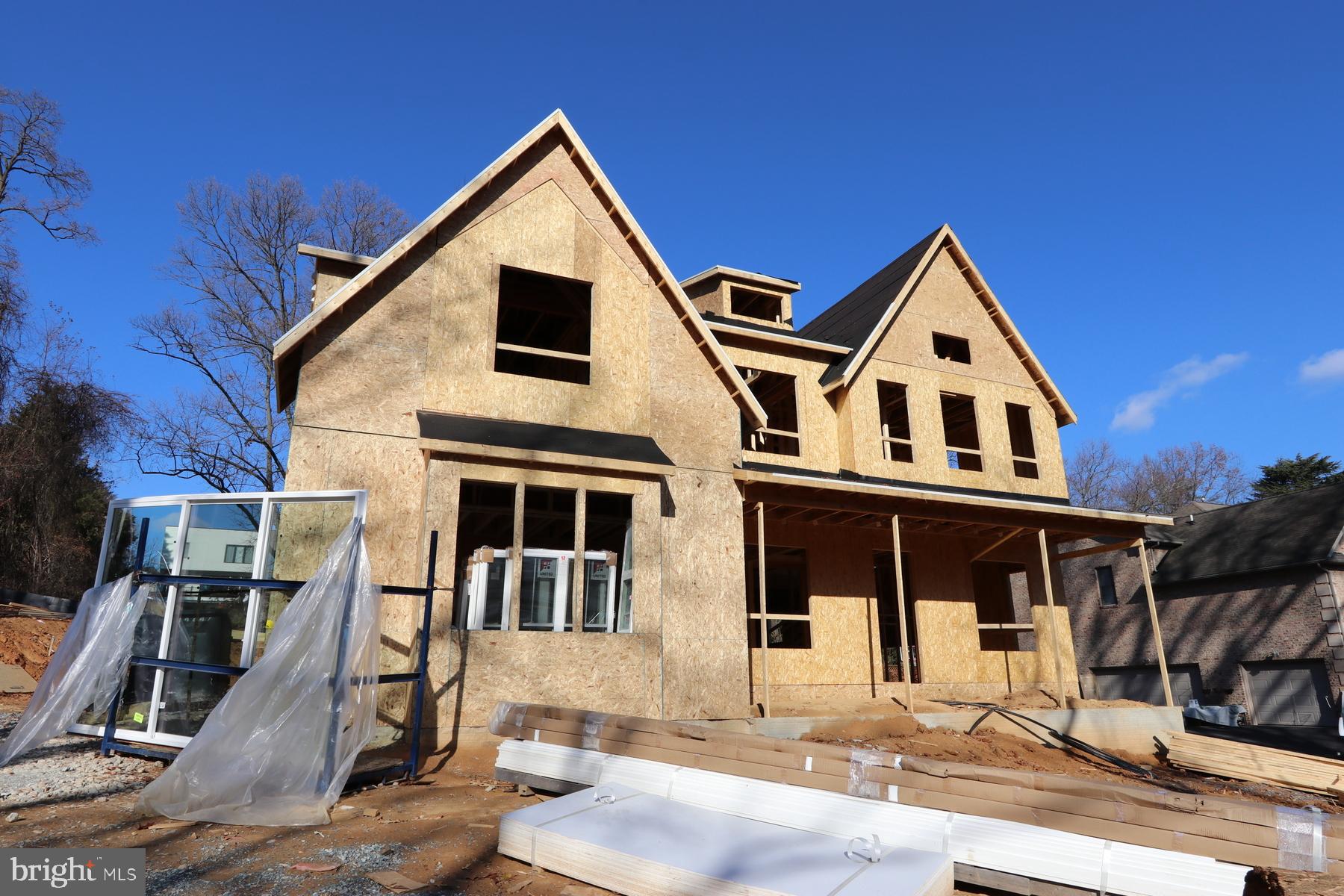 Welcome to Willerburn Acres, a close-in neighborhood in Potomac located in between Cabin John Village and Park Potomac.  The purchaser will have the opportunity to own a brand-new home to be built by Mid-Atlantic Custom Builders. Located on a 25,535 sq ft. lot., completion is scheduled for 2025.  This three-level home has 6 BR / 5 BR/ 1 HB and has 5533 sq. ft. of finished space.  Highlights include a Gourmet Kitchen with top-of-the-line appliances and a Center Island with prep and seating. Purchasers can choose from a myriad of cabinets and countertops.  A large Breakfast Area is adjacent to both the Kitchen and Family Room with  tray ceiling and additional fireplace. Additional rooms on the First Floor include a Living Room and Dining Room plus a Bedroom/Study with a Full Bathroom.   The Upper Level will not disappoint with a luxurious Primary Suite with large Primary Bathroom that has two vanities, freestanding tub and spacious shower with dual shower heads and two large walk-in closets. Completing the Second Floor are three additional Bedrooms and two Full Bathrooms plus a Loft that could easily become a fifth Bedroom. The Laundry Room and elevator shaft provide convenience and options as well. The Lower Level features a Recreation Room, Bedroom and Full Bath plus two additional Rooms perfect for Home Theater and Hobby Room.
Purchasers also have the option of bringing their own plans, custom designing or selecting from the many floor plans Mid-Atlantic has built during their 45 years in business.  Be assured of the highest quality and attention to each and every detail. Photos are from past homes Mid-Atlantic has built.