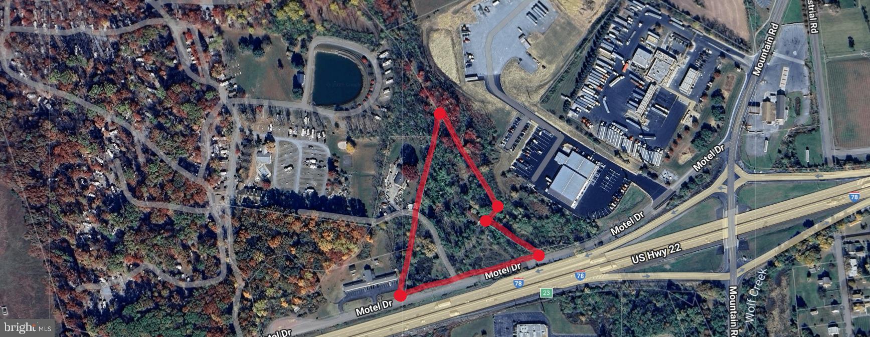 Prime highway commercial location in Shartlesville, Berks County PA.  Highest and best use is redevelopment for uses withing the HC zoning guidelines.  4.49 acres with over 700 feet of road frontage facing Rt. 78 with daily traffic count of over 33,000. Wide range of allowable uses -Public sewer line currently runs through the property.  Contact listing agent for specific zoning information.  Located nearby is Appalachian Campgrounds, Kenworth Trucks, Love's Truck Stop and Dunkin'.