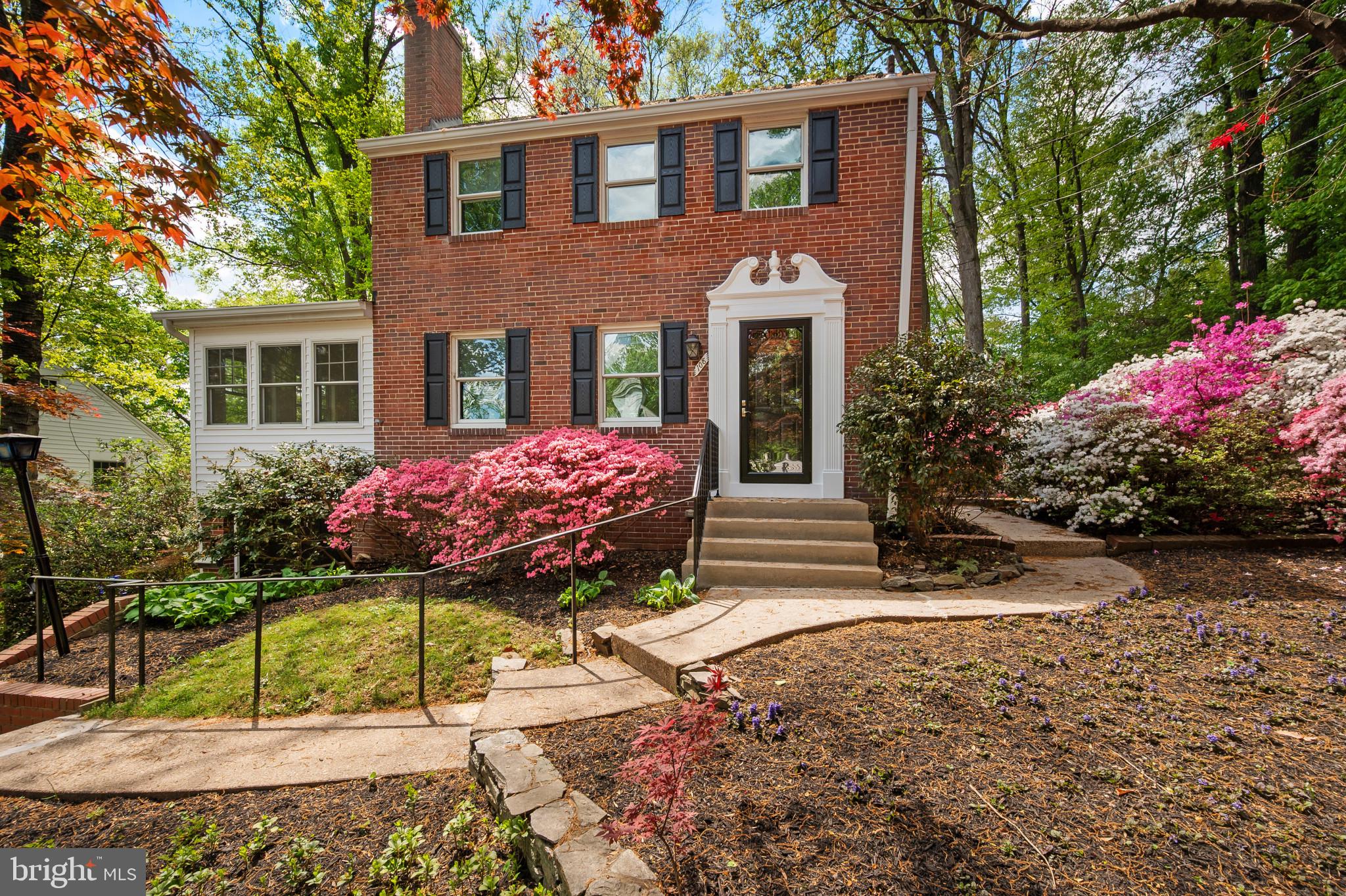 Sligo Park Hills, Silver Spring, Maryland - Built 1942  - 4 Bedrooms  -  2 Full Bathrooms  -  1,856 Sq Ft  -  327 Sq Ft Attic Loft  -  1 Car Attached Garage.  A charming brick colonial with authentic character and lasting appeal. 108 Denver Road offers the warmth of a classic home from the 1940s, thoughtfully maintained and situated in the heart of Sligo Park Hills.     

THE NEIGHBORHOOD:  

This home sits at one of the main entrances to Sligo Park, offering direct access to walking and biking trails that wind through the park and connect to Downtown Silver Spring. The neighborhood itself is quiet and established, with tree-lined streets and a real sense of community. It's the kind of place where you can walk to the park or take an easy bike ride into town.   

THE HOME:     

Hardwood Floors & Living Spaces: Hardwood floors run throughout the main and second floors, showing the craftsmanship of an earlier era. The living room features built-in shelving, a fireplace, and a generous bay window. Attached to the living room is a four-season sunroom with heat and air—a comfortable spot year-round. The dining room opens naturally into the living room, creating a flowing main floor. The kitchen is spacious and positioned conveniently near the dining room, making everyday living and entertaining straightforward.  

Upstairs & Attic Space:  The second floor has three bedrooms and a full bath. Additional semi-finished attic space offers room to expand—perfect for a home office, guest room, or storage.
Basement: The finished basement includes a full bathroom, living area, and separate bedroom, making this effectively a five-bedroom home if needed.   

OUTSIDE and CONDITION:      

The home has been freshly painted in light, neutral tones. Outside, mature shade trees frame the property, and there's a comfortable backyard patio. A one-car attached garage provides convenient parking. The landscaping uses natural materials, maintaining the quiet charm of the older neighborhood.

LOCATION  LOCATION  LOCATION:     

This is a solid, well-built brick colonial with the character and craftsmanship of homes from its era. The location—steps from Sligo Park and a walkable neighborhood—is hard to beat. If you're looking for an established home in an established community, with the bones to stand another eighty years, this is worth a visit.