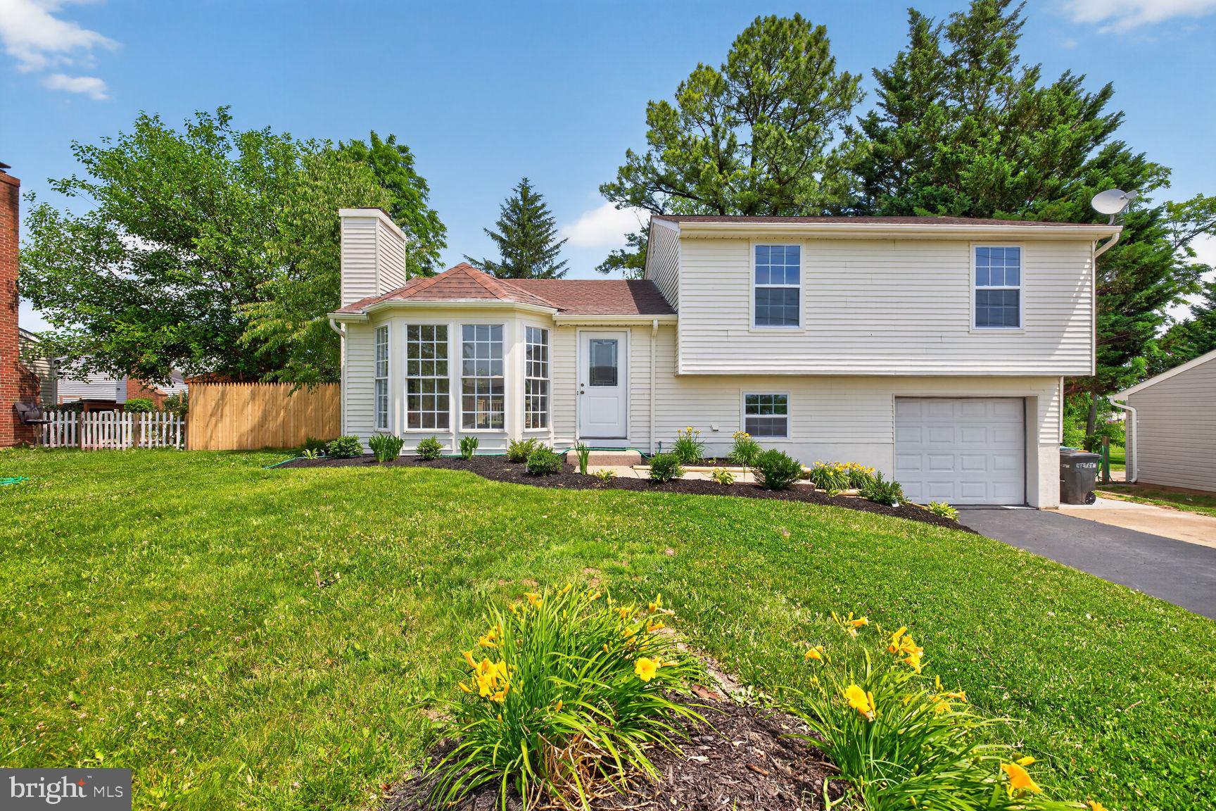 Welcome to Frederick Maryland! Location, location, location!!! This beautiful split level home is located near major routes. I-270, I-70, route 15, 40 (West Patrick St, the famous Golden Mile) Very close to many amenities, public transportation, shopping centers, banks, gas stations, Home Depot, grocery stores, etc. Walking distance from Butterfly Elementary School. Near Tuscarora & Frederick High School. Walking distance from Westside Regional Park. Several acres in the master plan are to be developed like the farm complex & festival grounds, water park & natatorium, multiple-purpose complex, etc. This home boasts 3 bedrooms upstairs with 2 full baths, the master bedroom has a full bathroom. The main level has a lot of space for entertainment, new laminated waterproof LVP flooring throughout the home. New open concept kitchen with an island, bonus room in the basement with a rough-in for another bathroom, architectural roof it's about 13 years old, big driveway, fenced backyard with fruit trees, deck, new sliding door, new windows and aluminum siding!