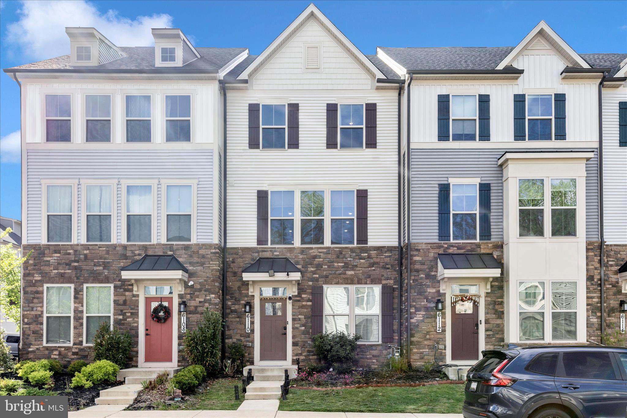 Price Reduction  - Priced to SELL!  Welcome to 6110 Stonecat Ct in one of the area's most desirable neighborhoods; where the convenience of townhome living marries with the luxury of single family amenities into one great house that you'll love to call home! Enter into the main level with a Family Room and Half Bath, perfect for weekend visitors! A two car rear garage means you never have to worry about parking again. The main living level is open plan and welcoming. A large kitchen island provides seating and functions as a command center for the home, letting you cook while never missing a minute with family or guests. The SkyLanai covered porch includes a fireplace, making it truly another living space, cozy and secluded while still protected to allow you to enjoy the outdoors, no matter what Mother Nature throws at you. The formal dining area rounds out this level along with a handy coat closet and powder room. Upstairs the grandeur continues with a magnificent owner's suite that features a huge closet, dual vanity bathroom and a Roman Shower. The secondary bedrooms are large and have plenty of storage - there's even a storage closet off the hall for even more space. The coveted second-floor laundry room is right outside the owner's suite for maximum convenience. Enjoy access to Lake Linganore amenities, including pools, trails, playgrounds, and community events, while living in a walkable, family-friendly environment.