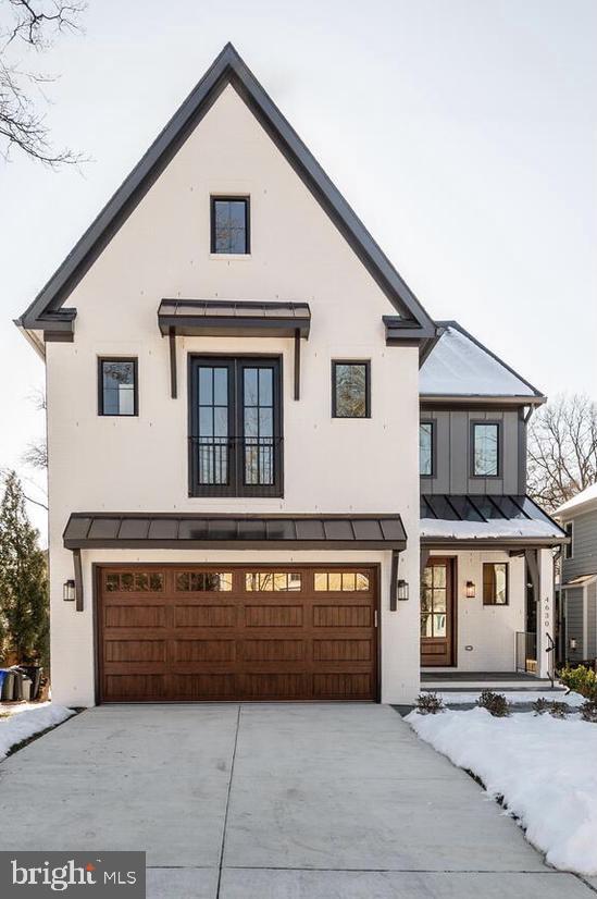 Located in the Woodlawn neighborhood - one mile from the Ballston Metro stop and the retail and restaurants of Ballston Quarter, this new home by Wormald/American Signature Properties is completed and ready for move in.  Special features include Bosch appliances, custom cabinetry, hardwood floors, eight-foot main level interior doors, two-car garage, five bedrooms and four and one-half bathrooms.  Located steps to Woodlawn Park this home is sited on a level lot with rear patio and backyard space for entertainment.  Backed by Wormald’s longstanding reputation – a family business with sixty years of building experience, attention to detail, and strong customer service warranty program.  Other lots and properties are available.