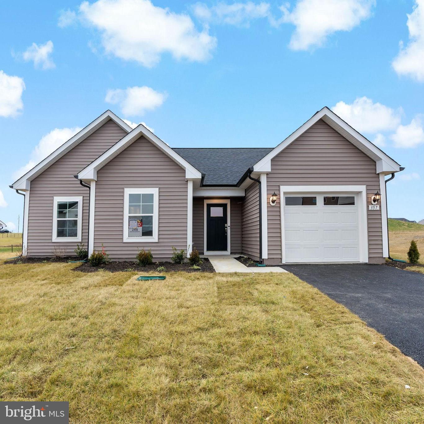 The Baldwin II is the perfect home! The unique rancher layout keeps the bedrooms on one side of the home and the entertainment and kitchen on the other side. This home has a spacious open layout. Upon entry, you are greeted with a coat closet for convenience. This home is complete 3 bedrooms and 2 bathrooms. The primary suite includes a walk in closet and ensuite bathroom. The secondary bedrooms have a complete bathroom to share. The kitchen is complete with Stainless Steel appliances, pantry, and an island.