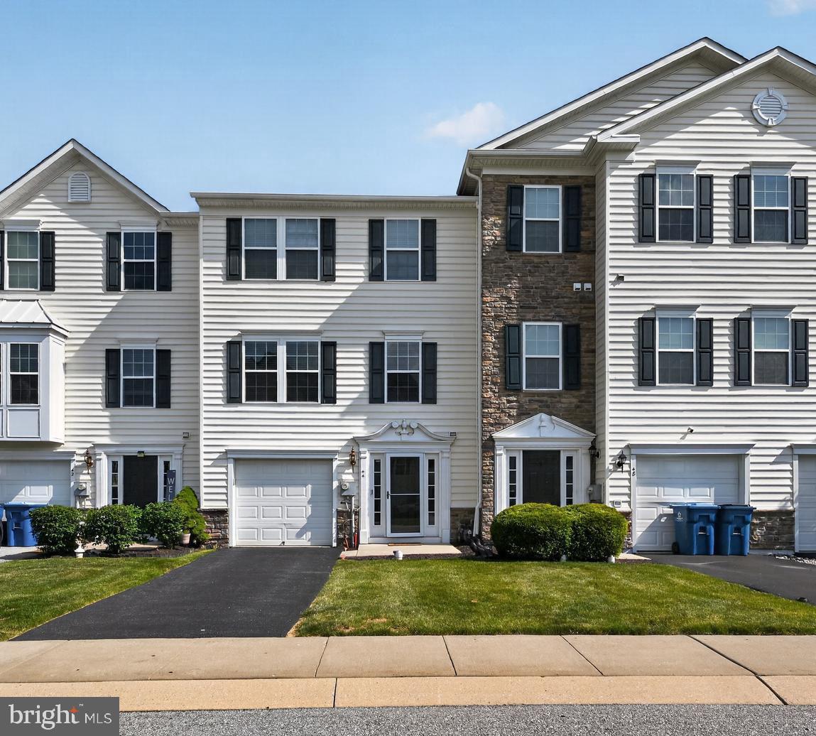 Welcome to this beautifully maintained 3-bedroom, 2.5-bath townhome in the desirable Round Hill community of Valley Township. Offering over 1,600 square feet of thoughtfully designed living space, this home features an open floor plan with 9-foot ceilings, hardwood flooring, recessed lighting, and abundant natural light throughout.
The spacious kitchen is designed for both everyday living and entertaining, featuring granite countertops, a center island, tile backsplash, pantry, and breakfast area with access to the rear deck. Adjacent living and dining areas create a comfortable flow, while the sunroom with a stone gas fireplace provides an inviting space to relax.
Upstairs, the primary suite offers vaulted ceilings, dual walk-in closets, and a private bath complete with a soaking tub, separate shower, and double vanity. Two additional bedrooms and a full hall bath complete the upper level.
The fully finished walk-out lower level provides flexible living space ideal for a family room, home office, fitness area, or recreation room, along with a convenient laundry area and access to the rear patio. Additional features include an attached one-car garage, central air conditioning, natural gas heat, public water and sewer, and ample storage.