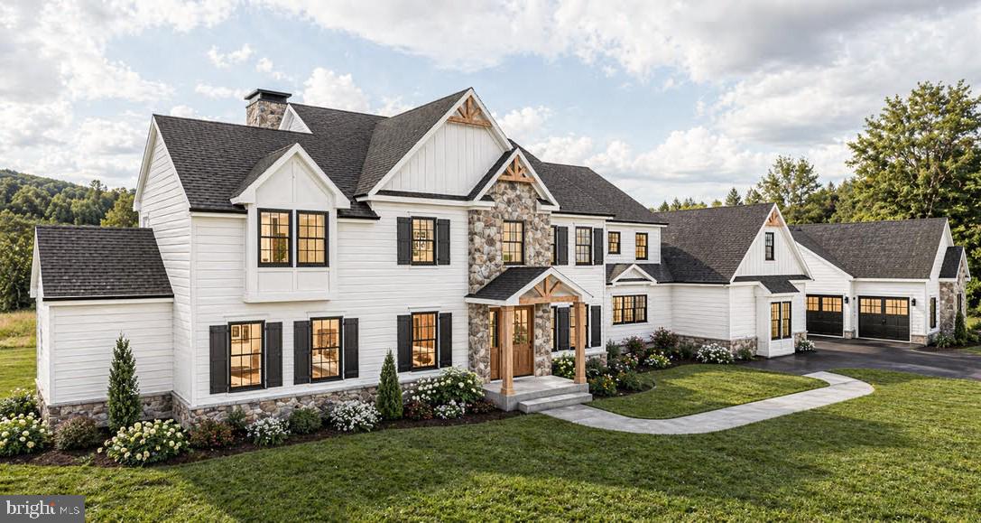 A dynamic design paired with the rare opportunity to build a new custom home in desirable Buckingham Township—this is luxury living reimagined.
Offering approximately 6,400 square feet, this exceptional residence is thoughtfully designed to impress the most discerning buyer. Crafted by Sycamore Hollow Homes, a respected builder with over 50 years of experience, the home reflects an unwavering commitment to quality, craftsmanship, and personalized service.
Construction is underway, yet there is still ample time to tailor every detail to your vision. This fully customizable home allows you to select finishes, features, and design elements that reflect your personal style, with Sycamore Hollow Homes delivering a refined and highly specialized approach to even the most intricate specifications.
A grand entry welcomes you, flanked by a private study and formal living room, and flowing seamlessly into the impressive family room featuring a cathedral ceiling and full bar—perfect for entertaining or relaxed evenings at home. The expansive kitchen offers endless possibilities for customization, designed to accommodate even the most specialized culinary features. The home includes four generously sized bedrooms, each with its own en suite bath. The first-floor primary suite offers the convenience of main-level living, complete with a private en suite full bath and thoughtfully designed space for comfort and privacy.
Additional highlights include two staircases, 10' main floor ceilings, a spacious three-car garage, and a full-length farmhouse porch that enhances the home’s timeless appeal. Looking for more? Options such as an elevator, a multi-access deck, or a custom outdoor entertainment area can be seamlessly incorporated.
Located within the highly regarded Central Bucks School District, Buckingham Township is known as the cultural and historic heart of Bucks County—long cherished by artists, writers, and those seeking a refined yet peaceful lifestyle.
Base price: $2,199,900
Discover what’s possible at 3455 Durham Rd—where your vision can truly come to life