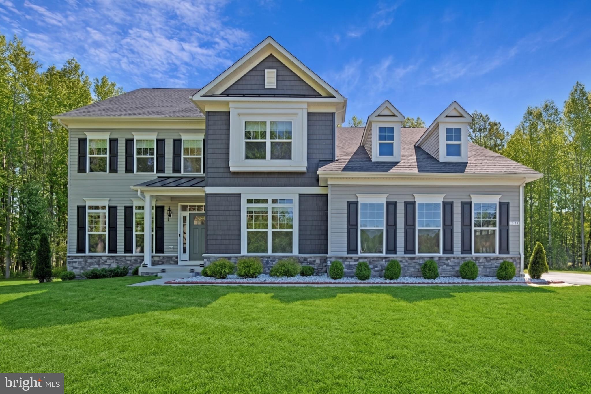 This stunning home offers a rare combination of comfort, style, and functionality, set on a peaceful, expansive lot that stretches over 5 acres. Nestled in a serene environment, this property backs to mature trees, providing both privacy and natural beauty.
The thoughtful open-concept layout creates a welcoming atmosphere, featuring high-end finishes throughout. The heart of the home includes a gourmet kitchen with a walk-in pantry, while a butler’s pantry ensures easy access for all your culinary needs. The master suite, a true retreat, boasts two cozy sitting areas, a luxurious walk-in shower, and a freestanding tub perfect for relaxation. A convenient temperature control system allows for customized hot water settings in the master suite, adding an extra level of comfort.
The home is designed with ease and convenience in mind. A Jack and Jill bathroom with double vanities ensures ease for shared spaces, while laundry facilities are conveniently located upstairs. Enjoy modern conveniences, including smart thermostats and motion lights around the house. A well-thought-out drainage system and backup battery for the sump pump ensure peace of mind, even during the harshest weather.
For visitors or extended family, an in-law suite with a separate entrance offers both independence and comfort. Outside, the property is fully equipped with a sprinkler system and a well-maintained yard, ideal for outdoor activities or peaceful relaxation.
With plenty of space for entertaining, a professionally designed layout, and multiple luxury features, this home is not just a place to live, but a lifestyle to experience. Photos may be virtually staged