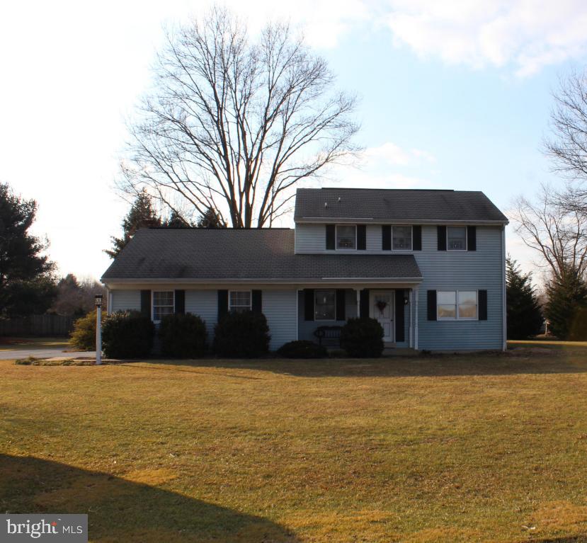 IF YOU LIKE COUNTRY YOU'LL LOVE THIS HOME!! WARM AND INVITING RURAL 2 STORY ON A LARGE LEVEL LOT. SPACIOUS COUNTRY KITCHEN LOADED WITH PLENTY OF COUNTER SPACE, LOTS OF DARK OAK CABINETS FOR STORAGE AND CERAMIC TILE FLOORS. HARDWOOD FLOORS IN DINING ROOM, LIVING ROOM, STAIRS AND 2ND FLOOR HALLWAY. WARM FAMILY ROOM W/ EXPOSED BEAMS AND BRICK HEARTH GAS FIREPLACE. SLATE TILE FOYER.