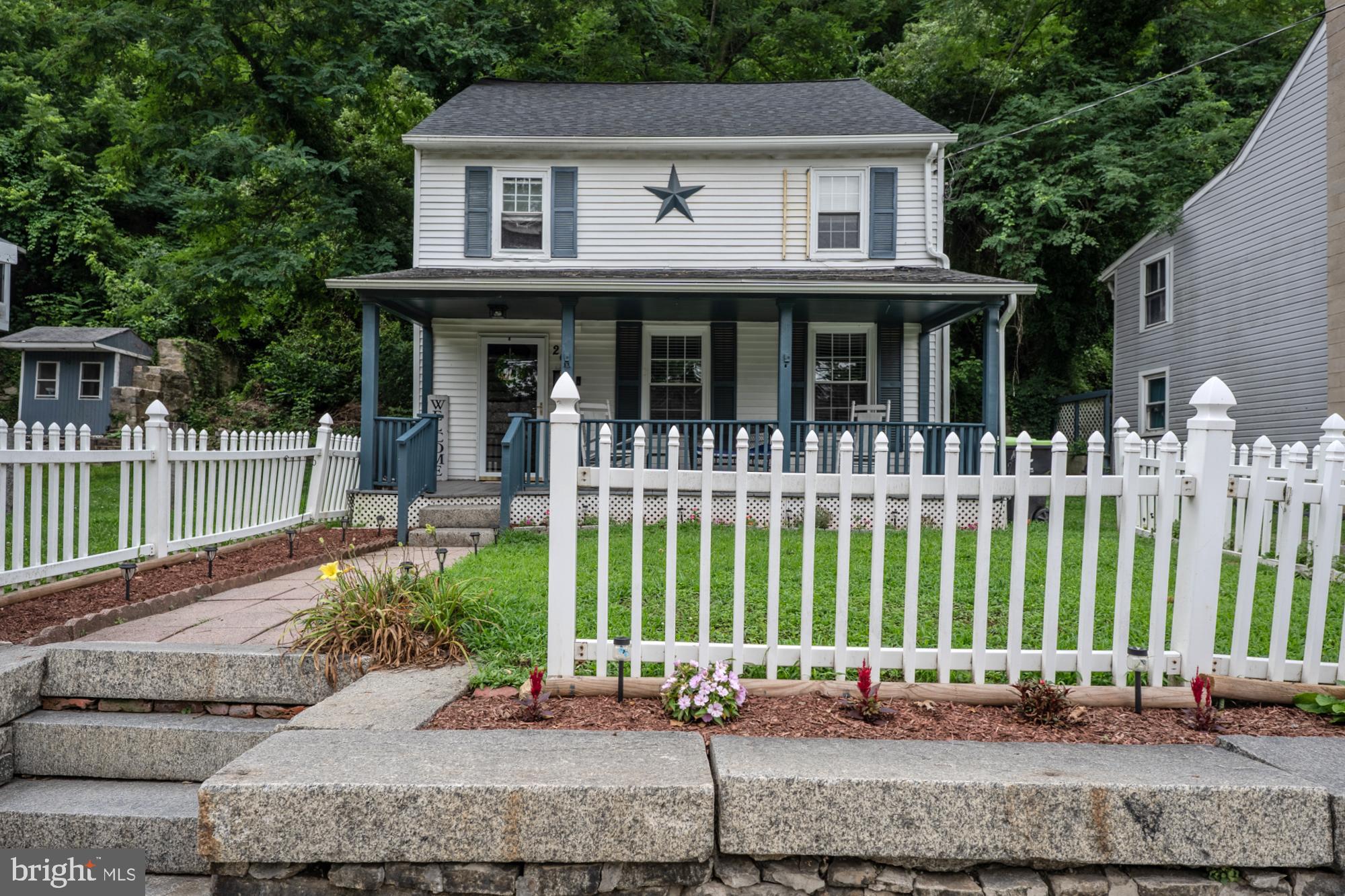 Welcome to this charming porch-front Colonial in the heart of historic Port Deposit! Rich in character, this home showcases many original features alongside thoughtful updates, including a new roof (2024), water heater (2024), porch ceiling (2024), and bathroom vanity (2026). The full bath has been freshly painted, and the staircase and banister have been beautifully refinished. The updated kitchen features newer appliances and a farmhouse sink, blending modern convenience with timeless charm. Spacious living and dining rooms provide plenty of room for entertaining, while a dedicated main-level laundry room adds everyday functionality. Upstairs, you’ll find three generously sized bedrooms, along with a large full bath and an unfinished bonus room that offers excellent storage or the potential for a fourth bedroom, home office, or flex space. Seamlessly flowing outside, you will find a covered rear porch, granite terrace, and private driveway. Being sold as-is.