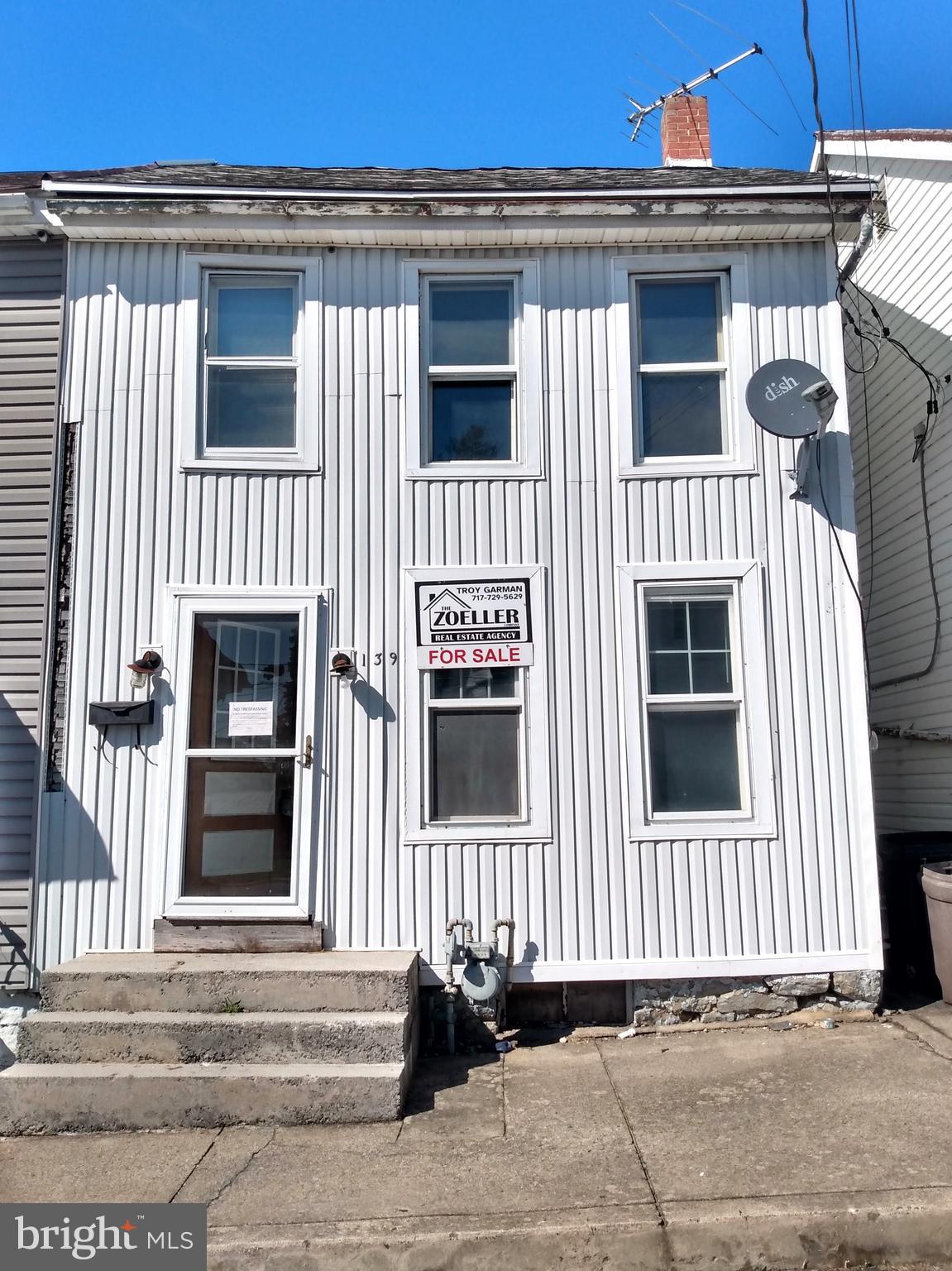 INVESTMENT OPPORTUNITY! This 3 bedroom 1 bath townhouse features: living room; dining room; kitchen with decent cabinets; 2 bedrooms on second floor; full bath with tub-shower; finished attic/3rd bedroom; main floor laundry; back porch; back yard; updated gas furnace; updated water heater; replacement windows; inexpensive property taxes; and more.  Conveniently location in the Borough of Waynesboro.