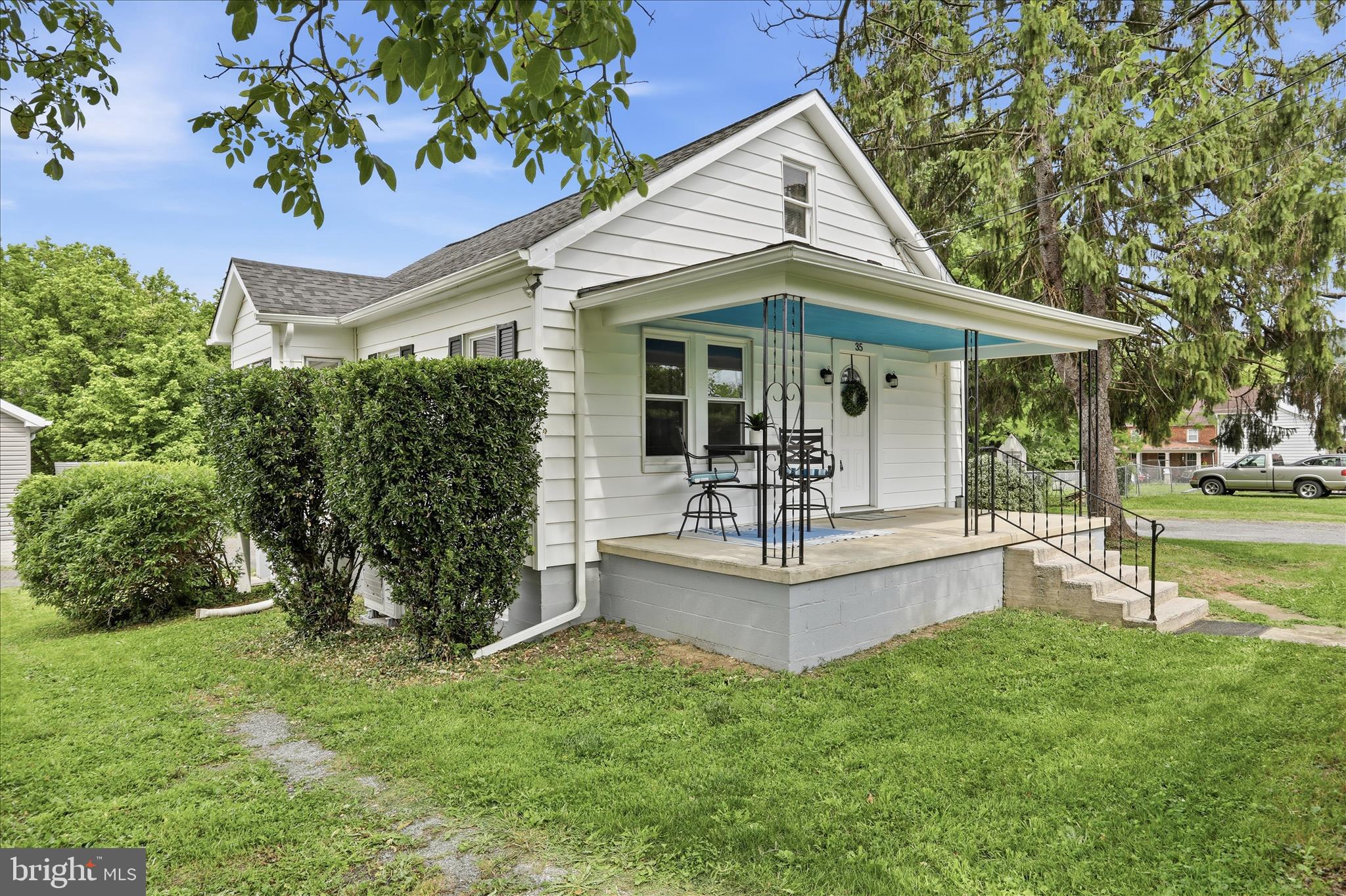 Charming and full of character, this adorable bungalow in Harpers Ferry offers the perfect blend of vintage charm and everyday convenience. Built in 1941, this two bedroom, one and a half bath home features hardwood floors, a welcoming living room with a charming coat closet, and an adorable kitchen with eat in table space. The bright and airy sunroom is sure to impress with its vaulted ceiling and abundance of windows, creating the perfect space to relax and unwind. Two bedrooms and a full bathroom are located on the main level, while upstairs offers a half bath, linen closet, and additional attic storage space. The unfinished walkout basement includes washer and dryer hookups, a sump pump, and plenty of room for storage or future possibilities.  Major updates include a new heat pump in 2025 and a roof replacement in 2022 for added peace of mind.  Outside, you will find a large paved driveway plus an additional separate driveway, offering ample parking space. The location is incredibly convenient, just minutes from Harpers Ferry National Historical Park, with easy access for commuters traveling to Maryland or Virginia. Conveniently located near shopping, dining, and everyday essentials.  If you are looking for charm, convenience, and character all wrapped into one adorable home, this bungalow is a must see.